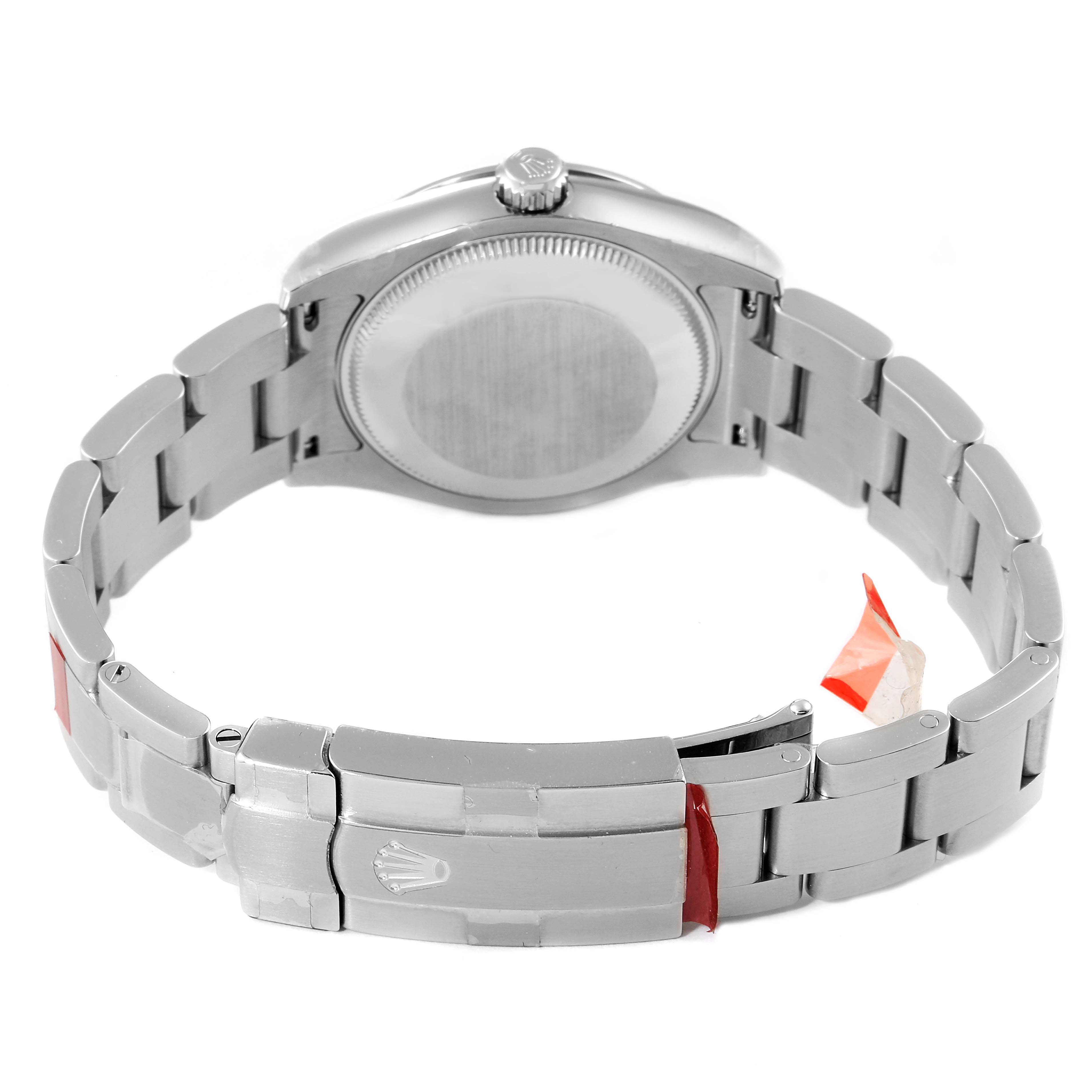 This Rolex Mid-Size 177200 Women's Stainless Steel White Dial 177200 Women's Stainless Steel White Dial model watch is shown from the back, displaying its bracelet and clasp.