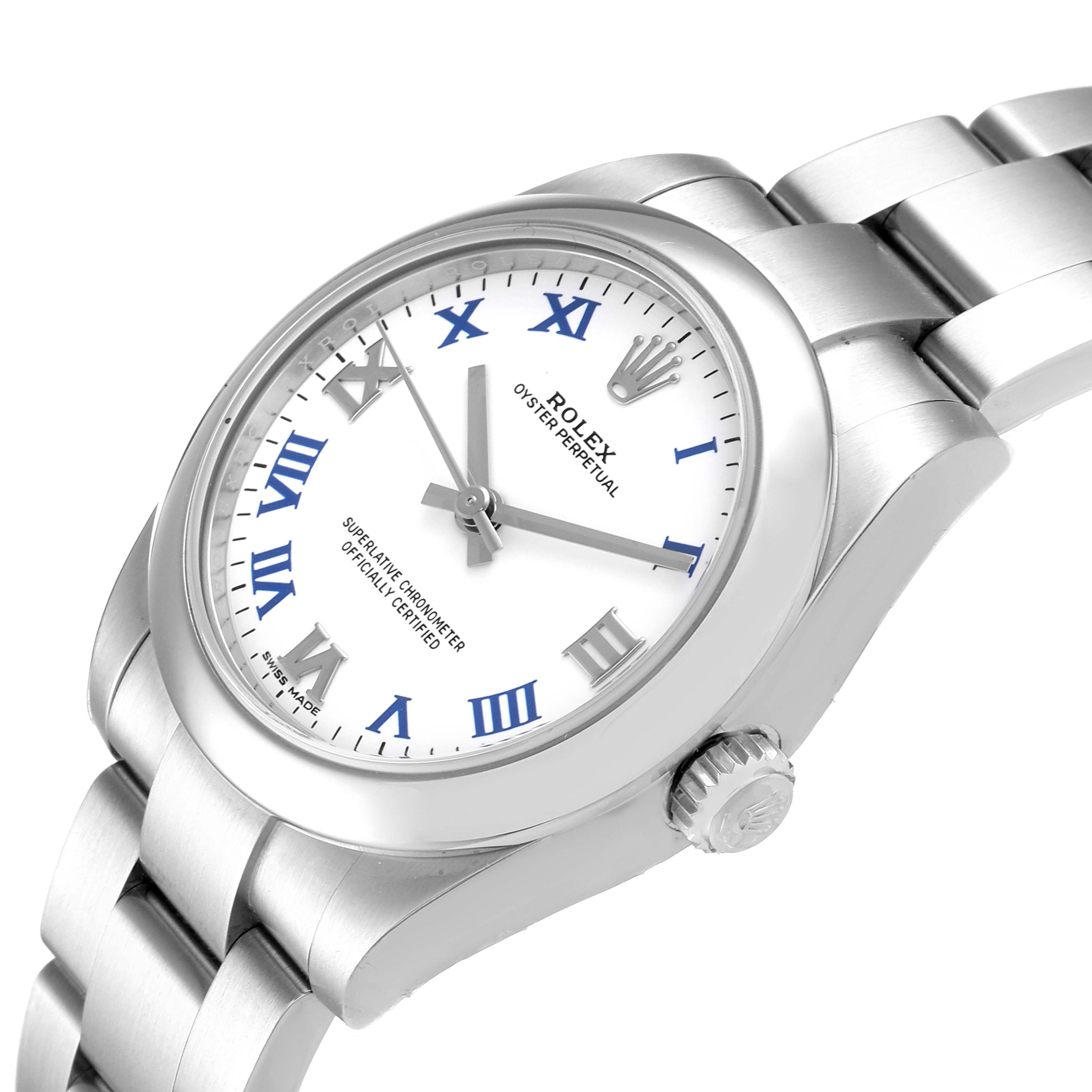 The image shows a Rolex Oyster Perpetual Mid-Size watch at a slight angle, highlighting the dial, case, crown, and bracelet.