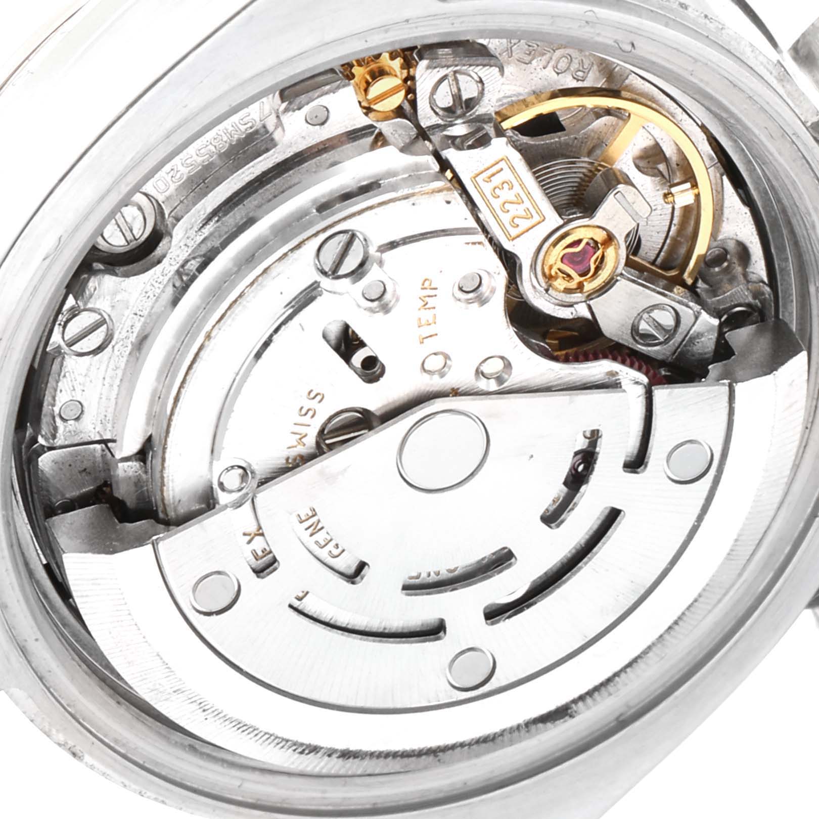 This image shows the movement mechanism of a Rolex Oyster Perpetual 176200 Women's Stainless Steel Black Dial 176200 Women's Stainless Steel Black Dial watch from a rear angle.