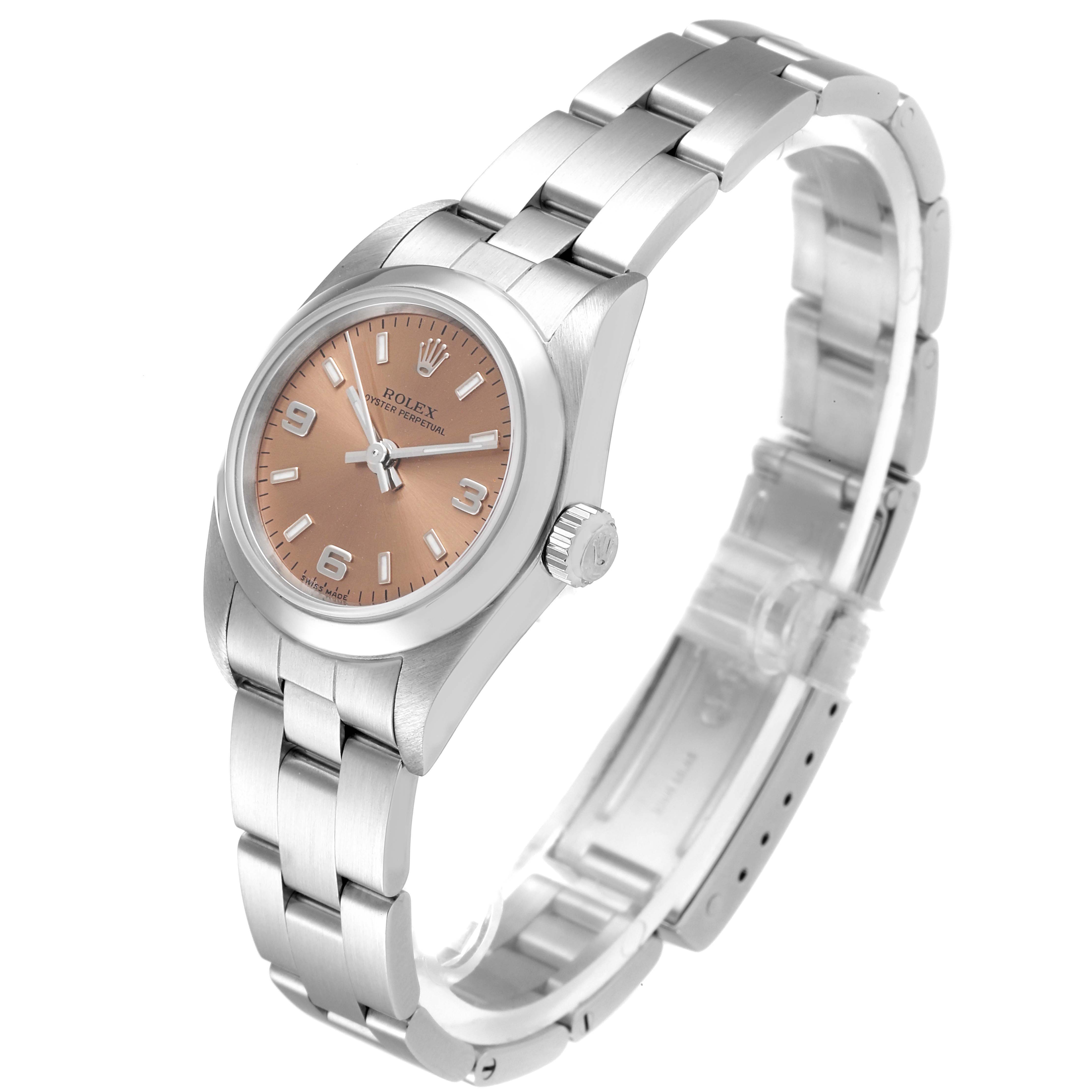 The Rolex Oyster Perpetual 76080 Women's Stainless Steel Pink Dial 76080 Women's Stainless Steel Pink Dial watch is shown at a slight angle, displaying the dial, bracelet, and crown prominently.