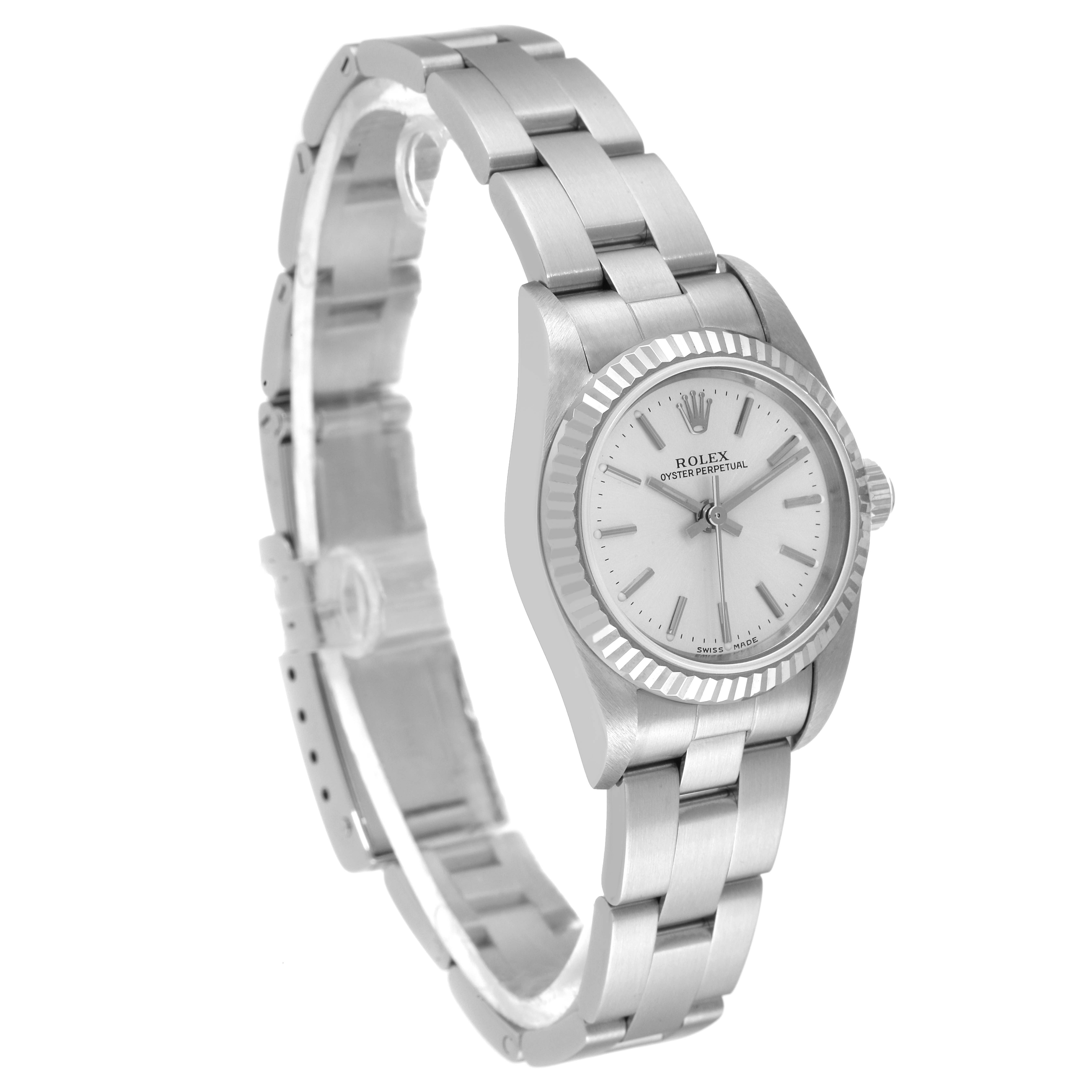 The image shows a Rolex Oyster Perpetual 76094 Women
s Stainless Steel Silver Dial 76094 Women
s Stainless Steel Silver Dial watch at a slight side angle, highlighting the dial, bezel, and bracelet.