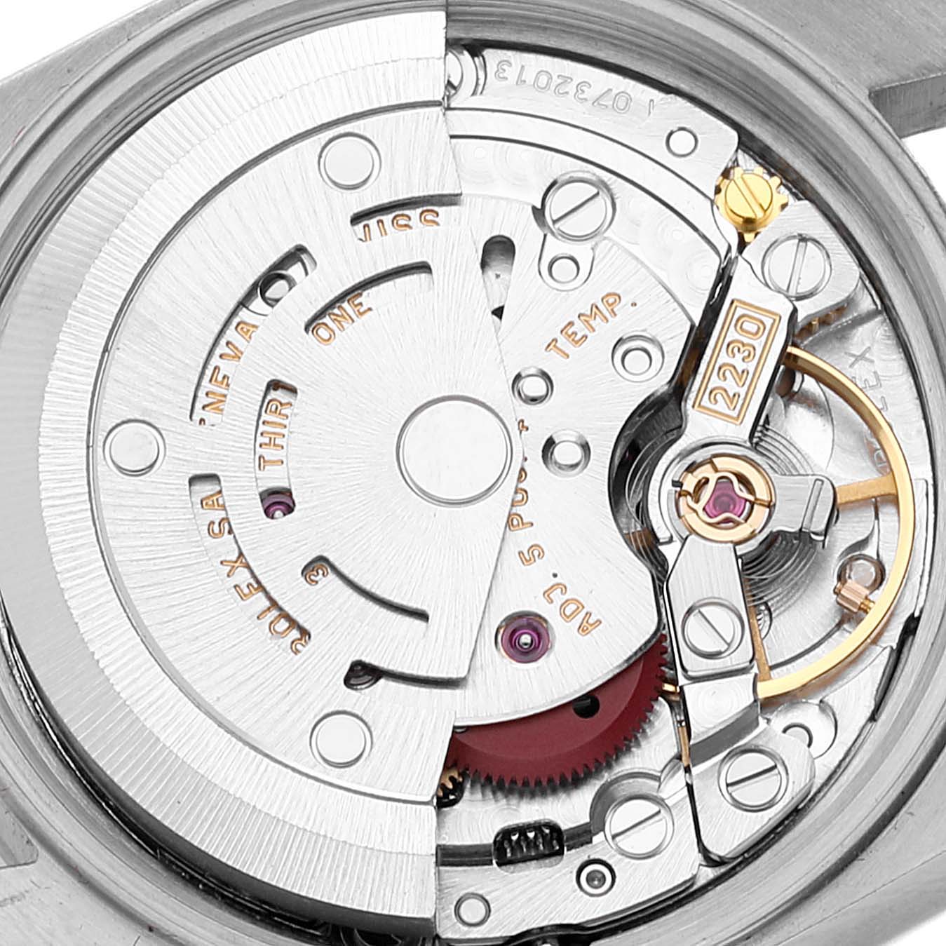 This image shows a close-up of the movement inside a Rolex Oyster Perpetual 76094 Women
s Stainless Steel Silver Dial 76094 Women
s Stainless Steel Silver Dial watch, highlighting the intricate components and mechanism.
