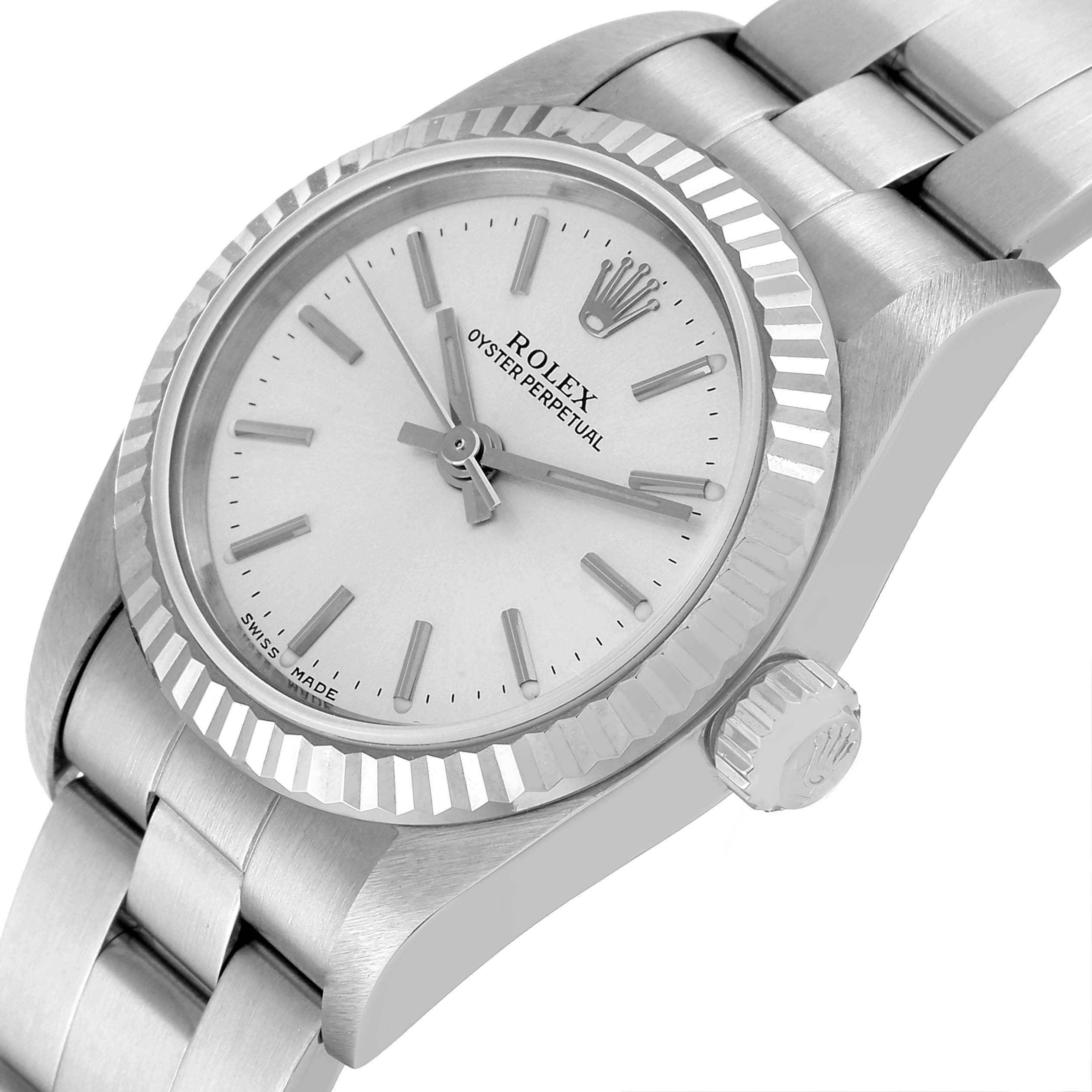 The image shows a close-up angled view of the Rolex Oyster Perpetual 76094 Women
s Stainless Steel Silver Dial 76094 Women
s Stainless Steel Silver Dial watch, highlighting its dial, bezel, and part of the bracelet.