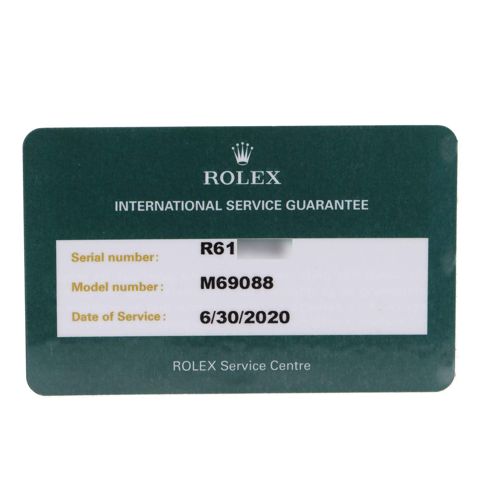 This image shows an International Service Guarantee card for a Rolex President 69088 Women's Yellow Gold Blue Dial 69088 Women's Yellow Gold Blue Dial model watch, including serial and model numbers with the date of service.