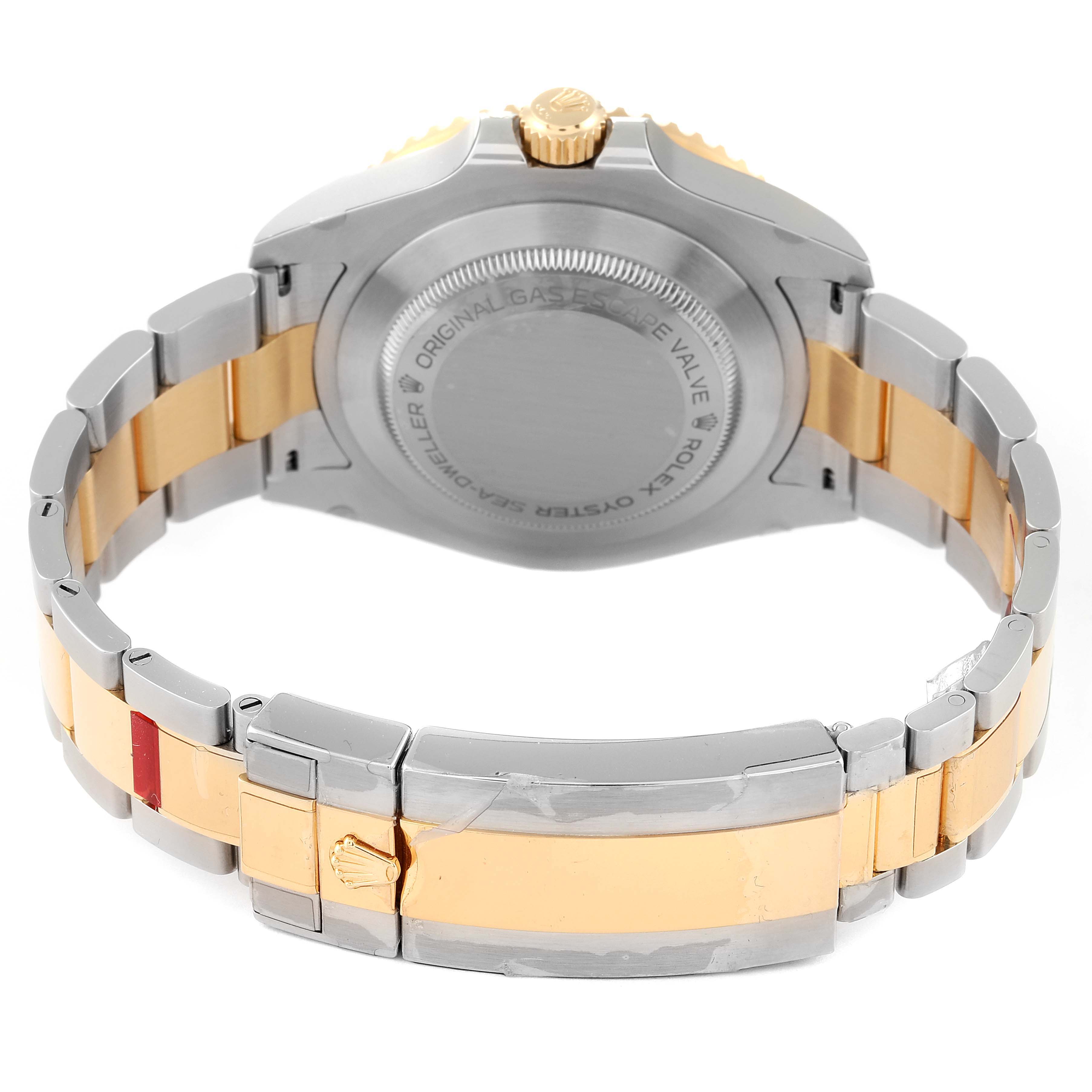 The image shows the back of the Rolex Sea-Dweller 126603 Men's Steel and Gold (two tone) Black Dial 126603 Men's Steel and Gold (two tone) Black Dial watch, focusing on the case back, bracelet, and clasp.