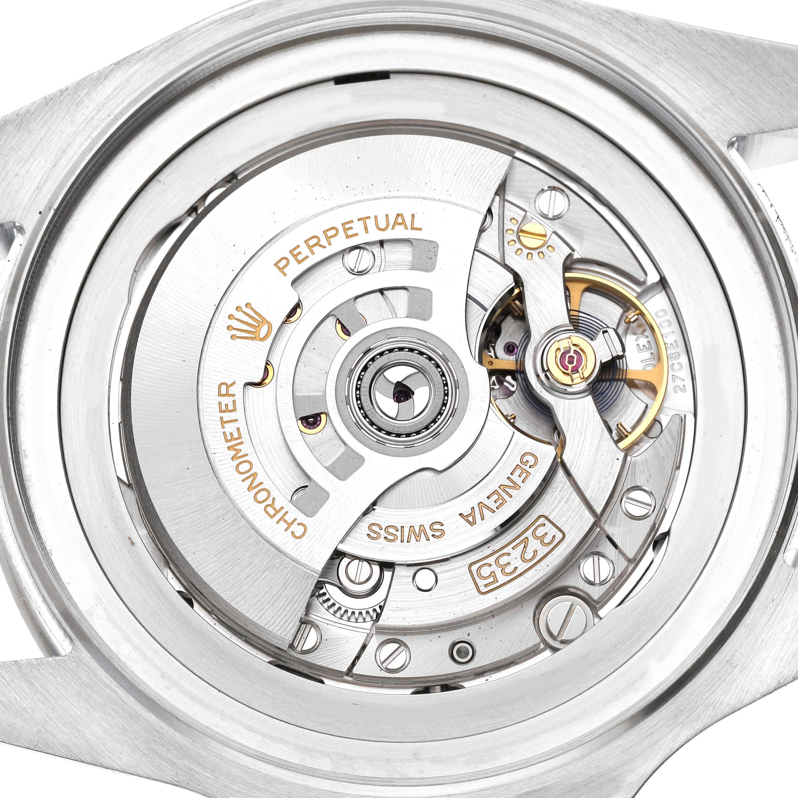 The image shows the open case back view of the Rolex Sea-Dweller 136660 Men's Stainless Steel Black Dial, highlighting its movement and rotor.