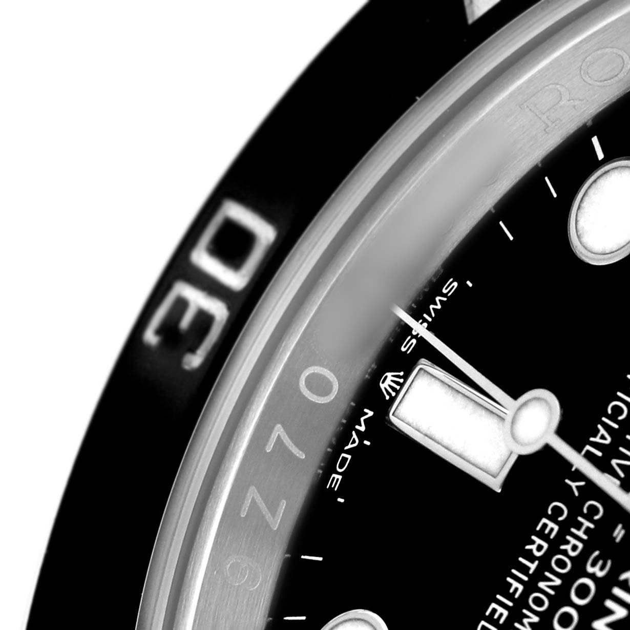 The image shows a close-up angle of the bezel and dial details on a Rolex Submariner M124060-0001 Men's Stainless Steel Black Dial watch.