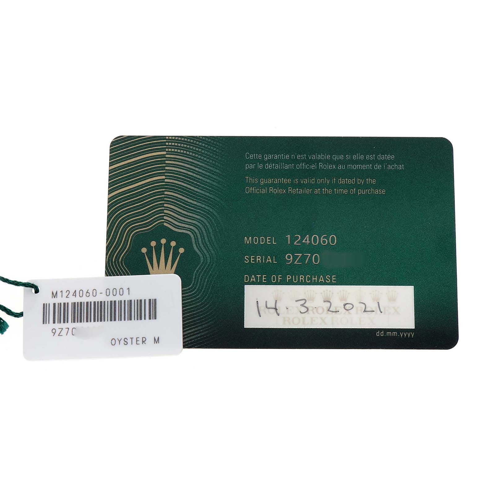 The image shows a Rolex Submariner M124060-0001 Men's Stainless Steel Black Dial warranty card with a model number and purchase date.