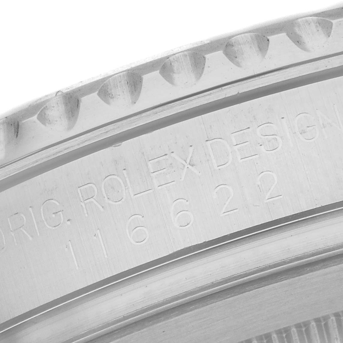 This image shows a close-up of the side of the Rolex Yacht-Master 116622 Men's Stainless Steel Blue Dial 116622 Men's Stainless Steel Blue Dial watch, displaying part of the bezel and the engraved model number.