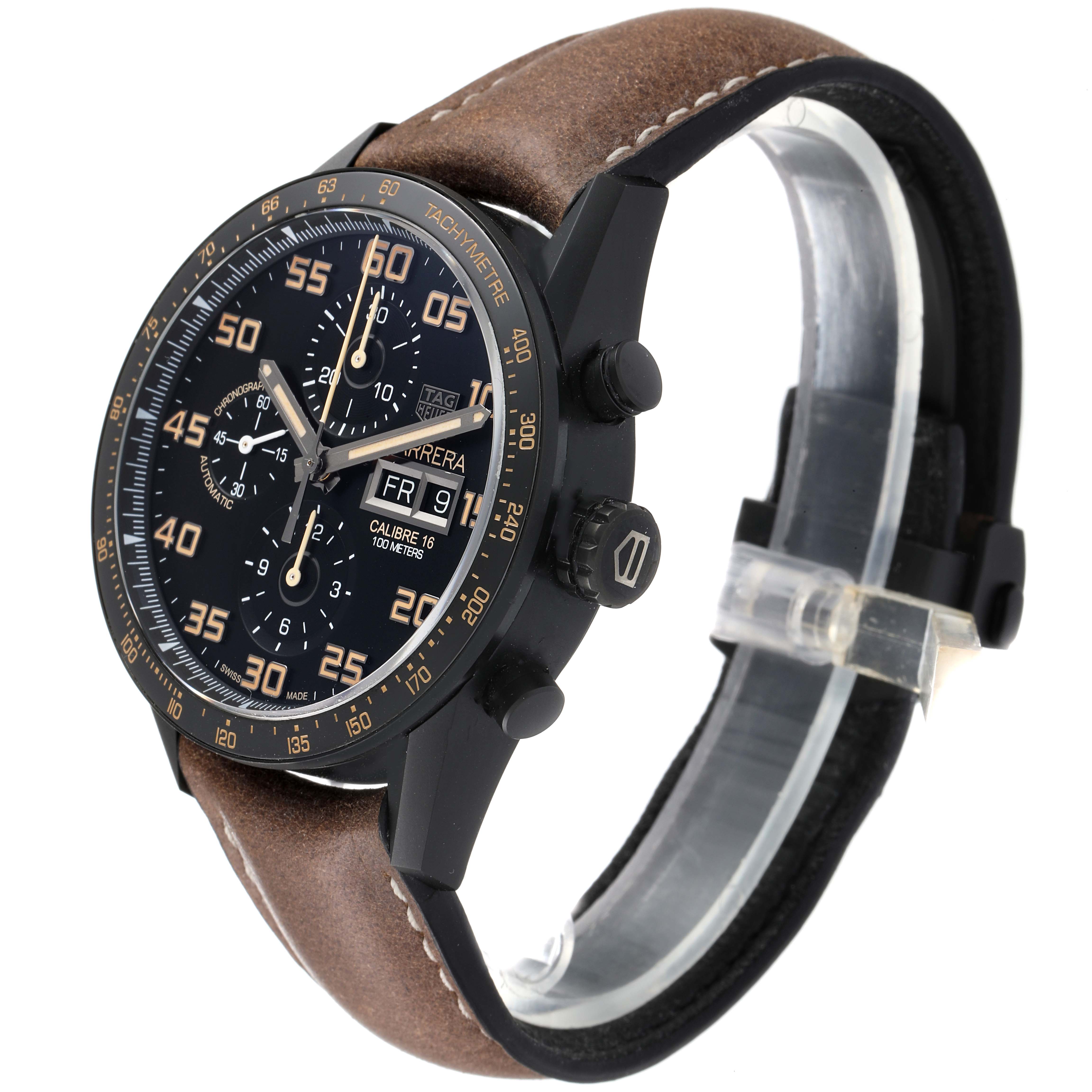 The image shows a Tag Heuer Carrera CV2A84.FC6394 Men's Titanium Black Dial CV2A84.FC6394 Men's Titanium Black Dial watch at a slight side angle, highlighting its dials, bezel, and brown leather strap.