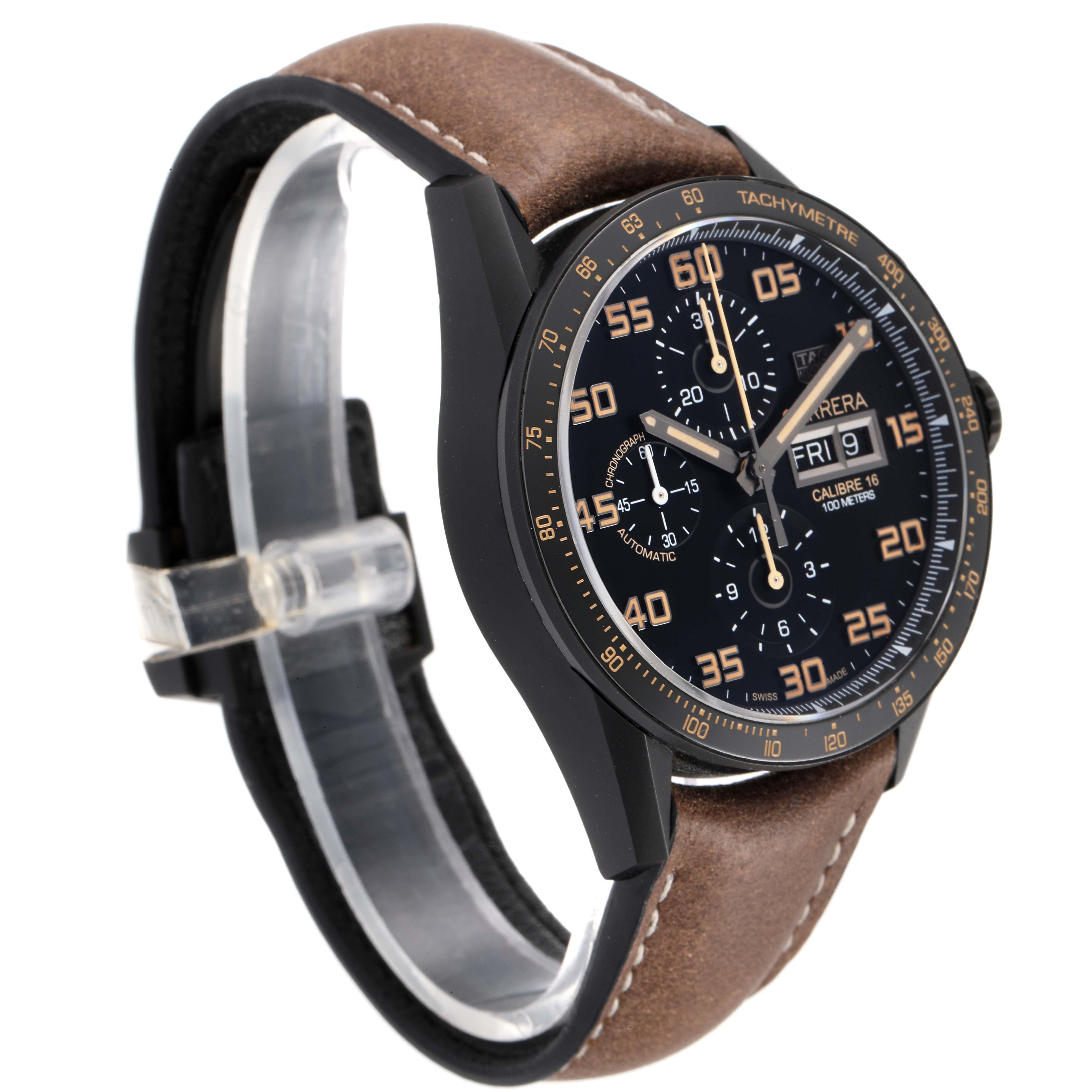 The Tag Heuer Carrera CV2A84.FC6394 Men's Titanium Black Dial CV2A84.FC6394 Men's Titanium Black Dial watch is shown at a three-quarter angle, highlighting its dial, crown, and brown leather strap.