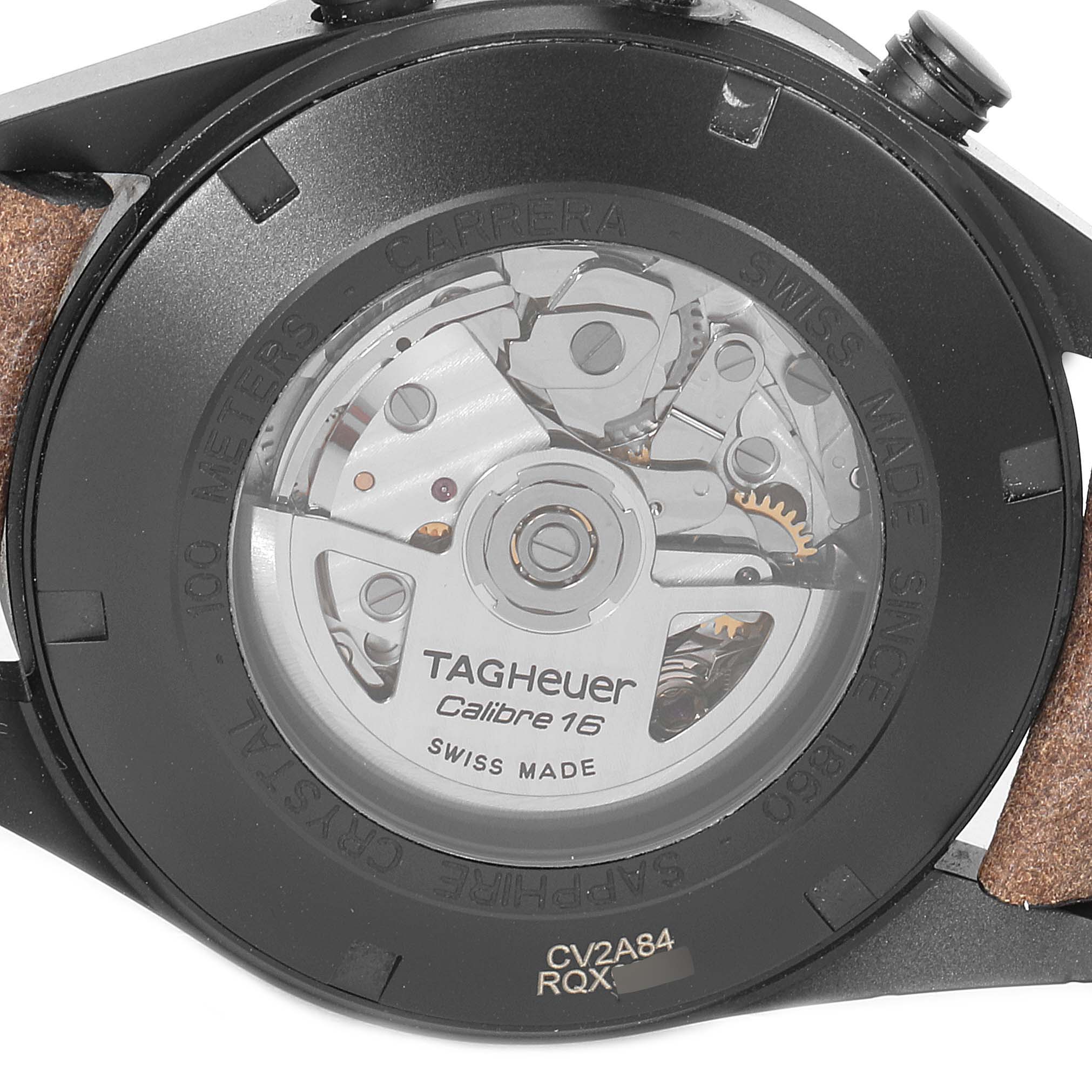 The image shows the back of a Tag Heuer Carrera CV2A84.FC6394 Men's Titanium Black Dial CV2A84.FC6394 Men's Titanium Black Dial watch, featuring its internal mechanisms and Calibre 16 engraving.