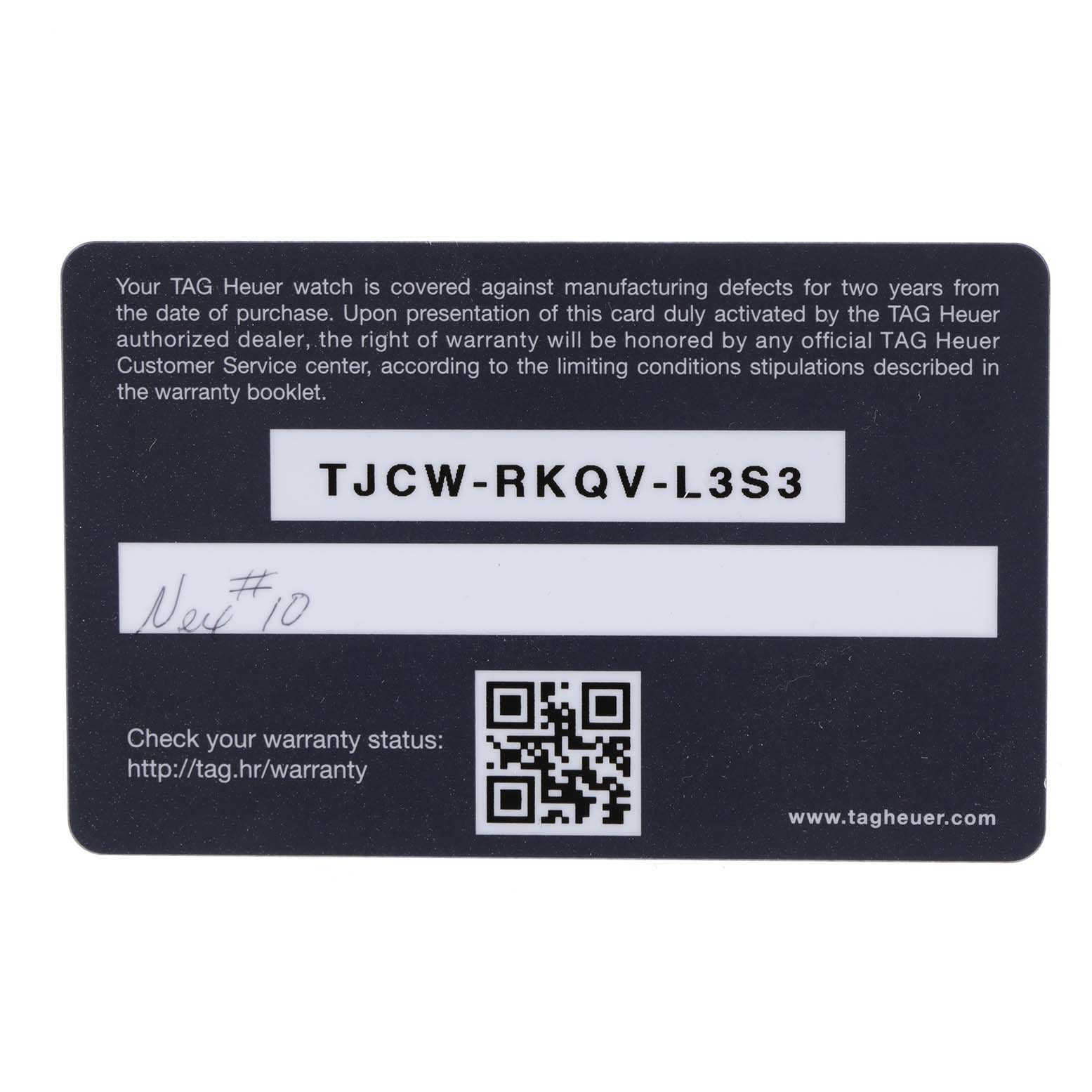 This is a close-up of a Tag Heuer Carrera CV2A84.FC6394 Men's Titanium Black Dial CV2A84.FC6394 Men's Titanium Black Dial model warranty card with a serial number, QR code, and text regarding the warranty terms.