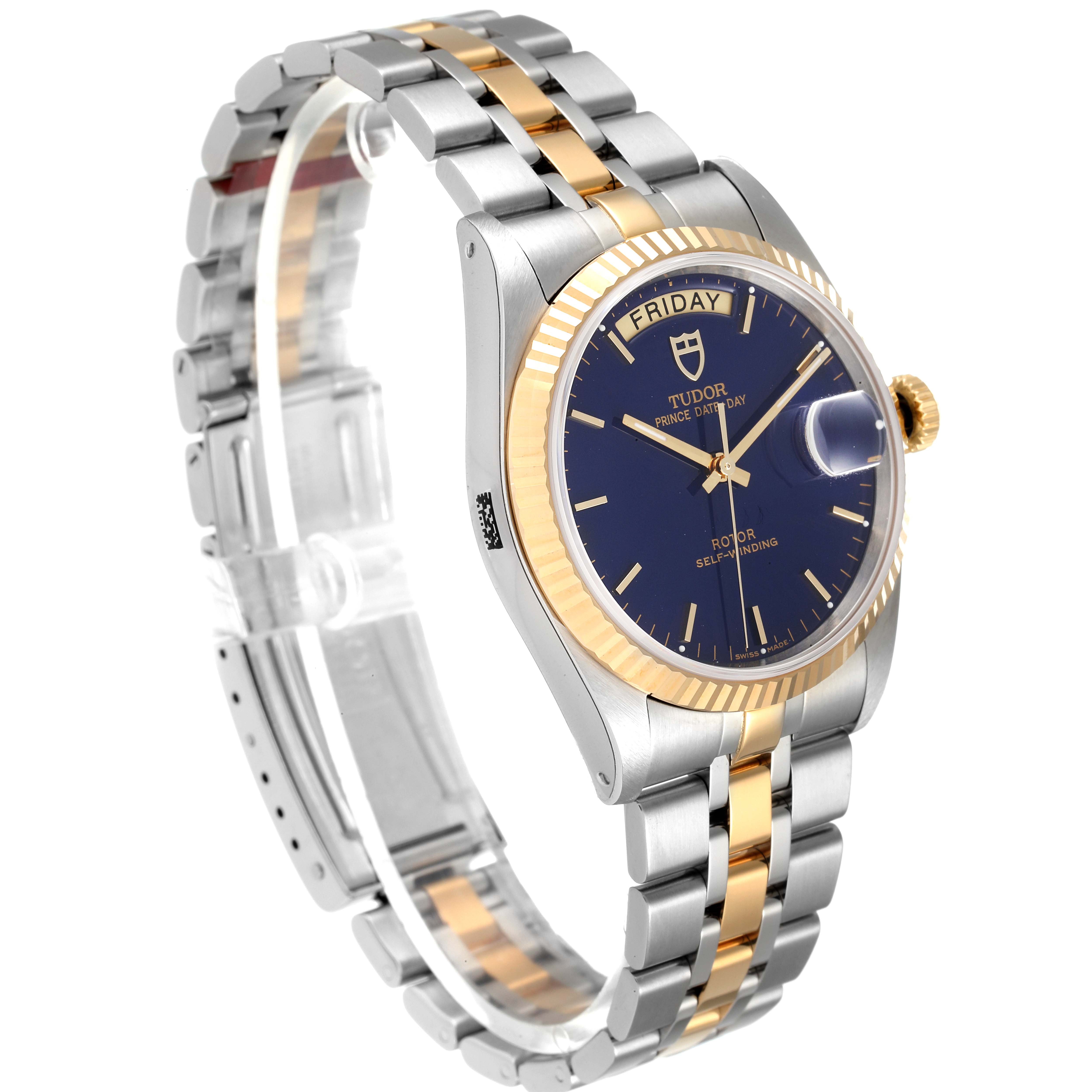 The image shows a Tudor Prince 76213 Men
s Steel and Gold (two tone) Blue Dial 76213 Men
s Steel and Gold (two tone) Blue Dial model watch at an angle displaying its face, bezel, bracelet, and crown.