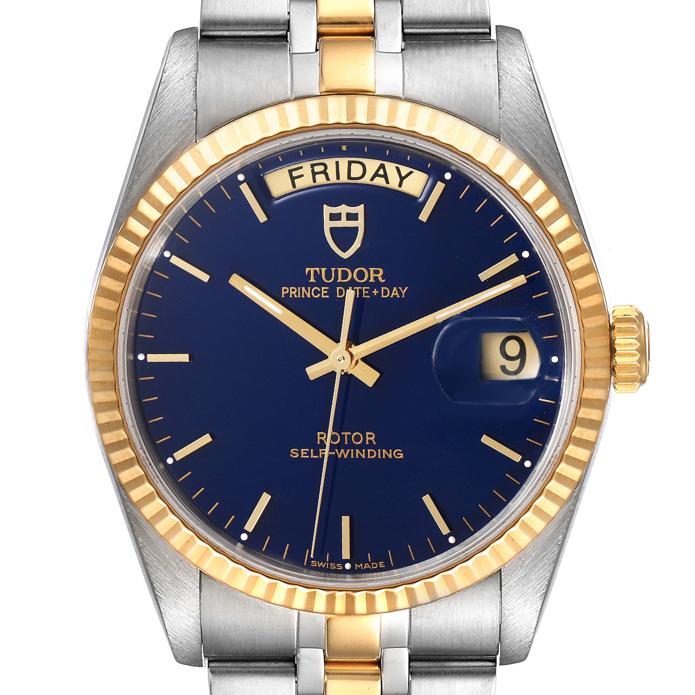 The image shows a close-up of the Tudor Prince 76213 Men
s Steel and Gold (two tone) Blue Dial 76213 Men
s Steel and Gold (two tone) Blue Dial Model watch, featuring a blue dial, gold fluted bezel, day-date display, and gold-silver bracelet.