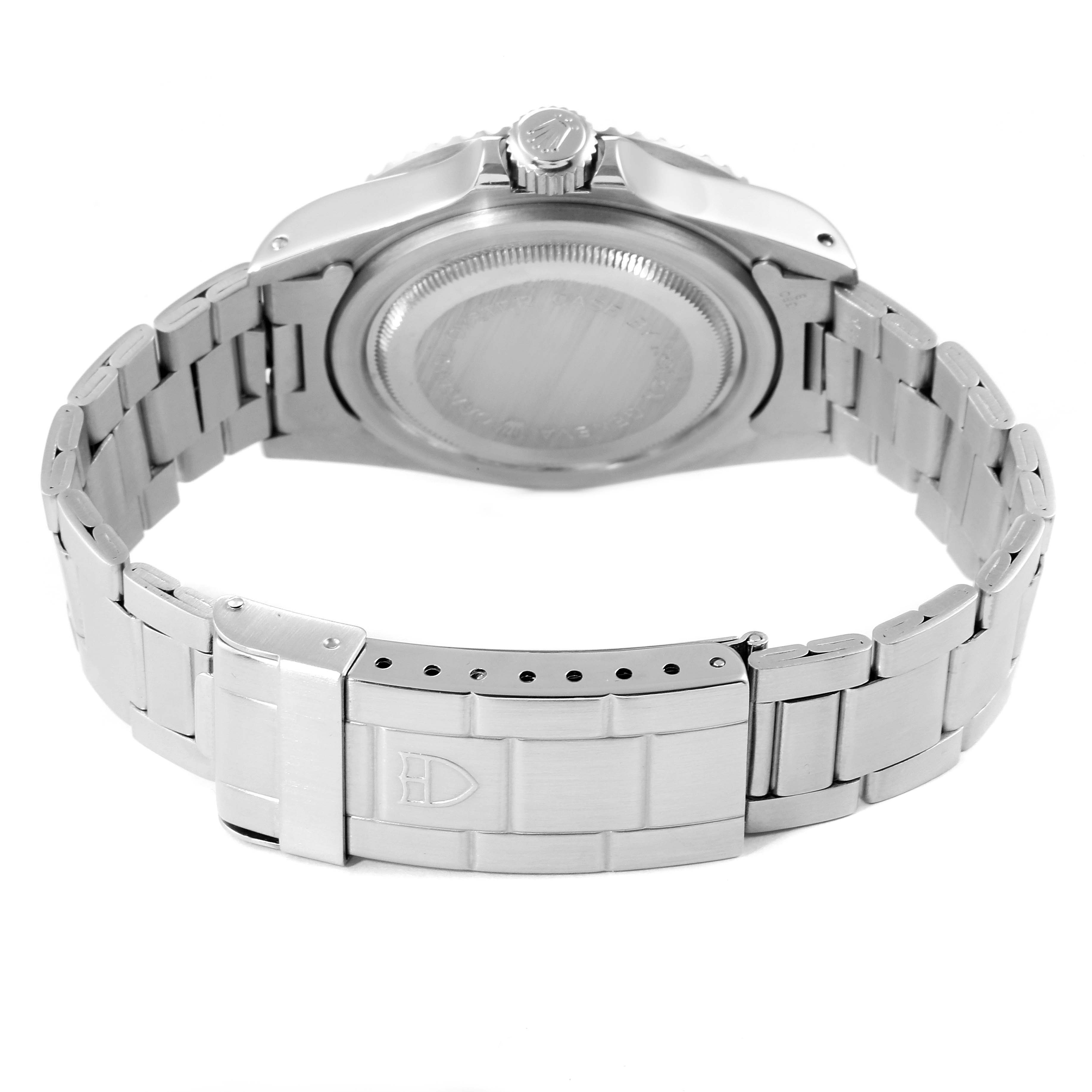 The image shows the back case and bracelet of a Tudor Submariner 79090 Men's Stainless Steel Black Dial 79090 Men's Stainless Steel Black Dial watch, viewed from the rear angle.