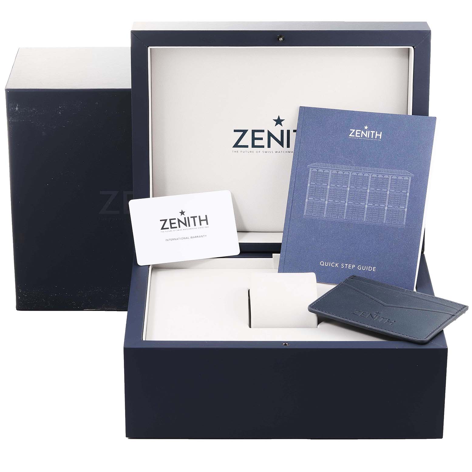 The image shows a Zenith Chronomaster 03.3100.3600 Men
s Stainless Steel White Dial 03.3100.3600 Men
s Stainless Steel White Dial watch box including a warranty card, a quick step guide, and a cardholder.