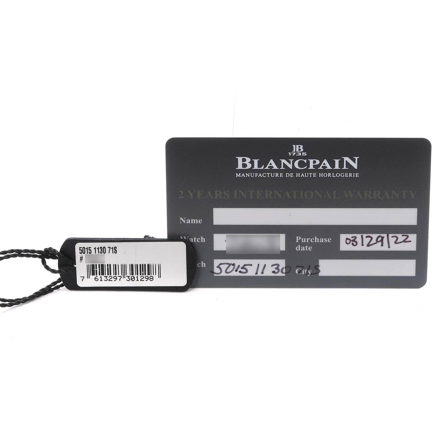 The image shows a warranty card and tag for the Blancpain Fifty Fathoms, model number 5015-1130-715, with no watch visible.