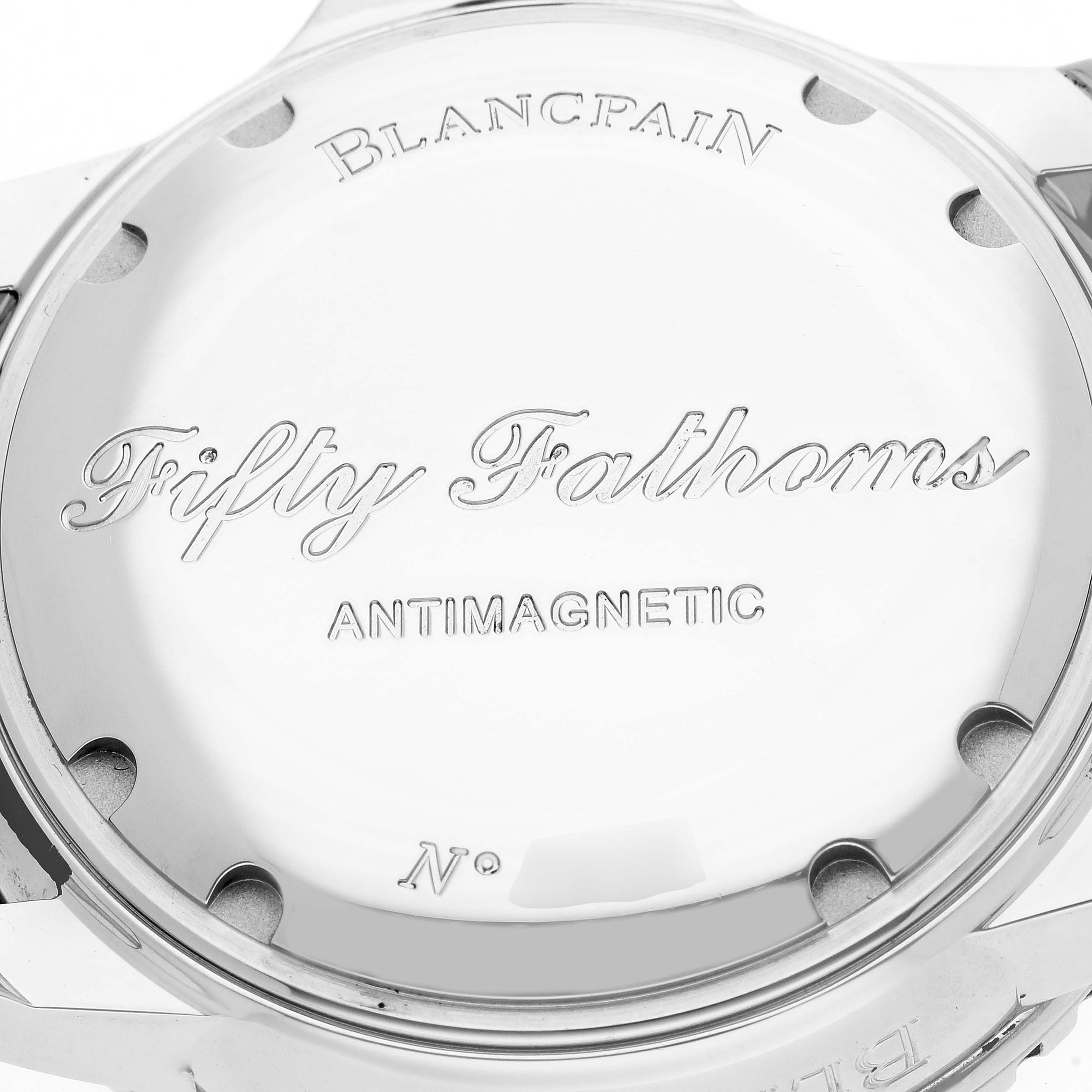 The image shows the back case of a Blancpain Fifty Fathoms model 5015-1130-715, highlighting its branding and "Antimagnetic" engraving.