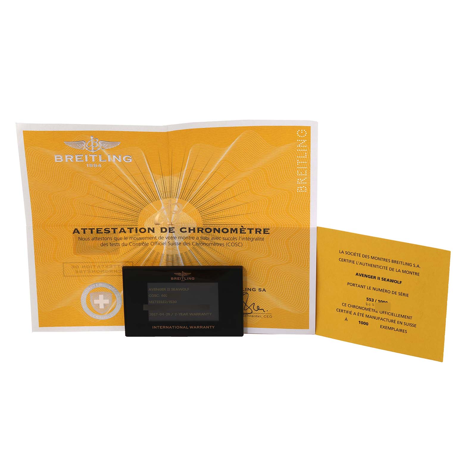 The image shows the Breitling Avenger M17331 Men's Stainless Steel Yellow Dial M17331 Men's Stainless Steel Yellow Dial watch's authenticity certificate, warranty card, and chronometer attestation documents.