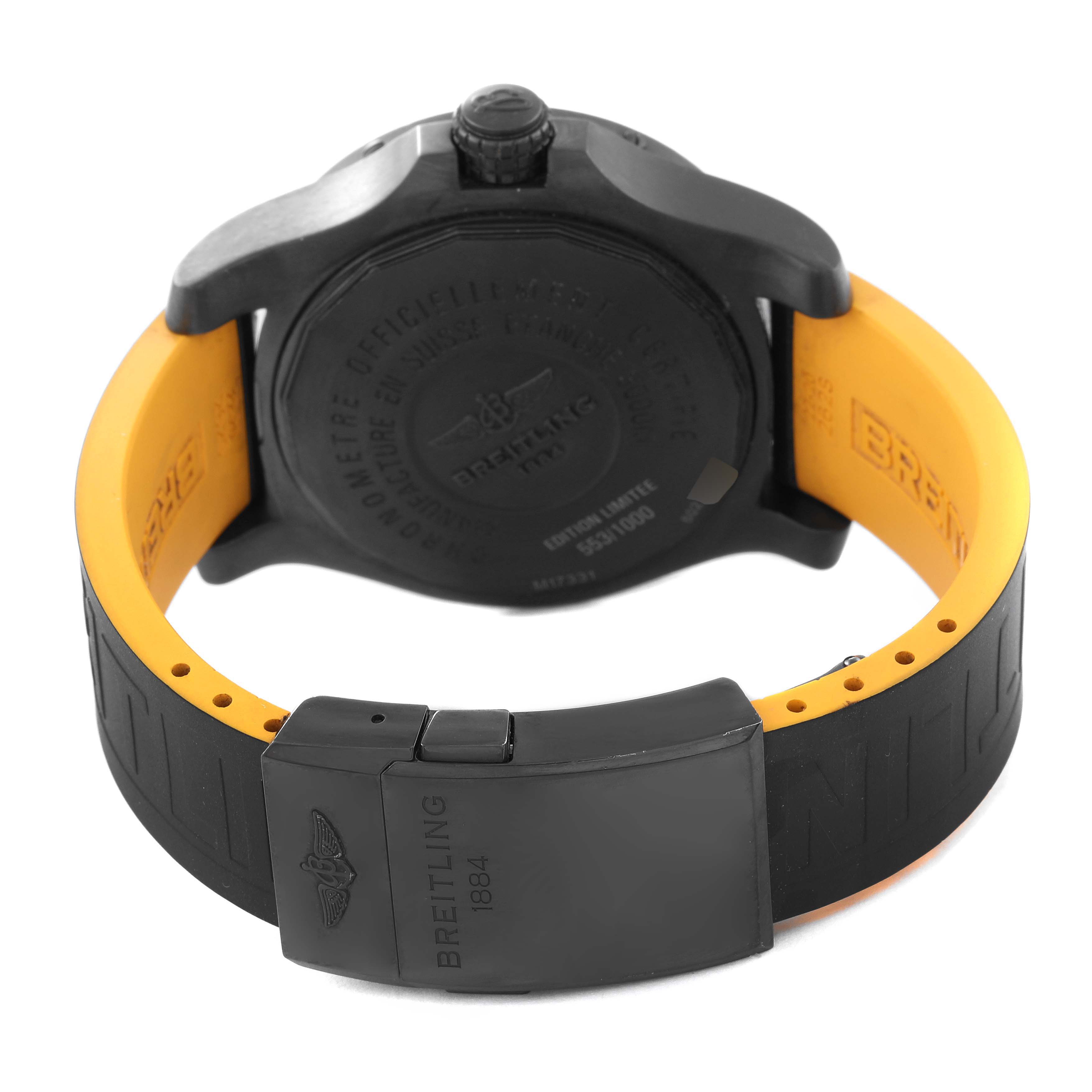 The image shows the back view of the Breitling Avenger M17331 Men's Stainless Steel Yellow Dial M17331 Men's Stainless Steel Yellow Dial watch, including its case back, crown, and black and yellow strap.