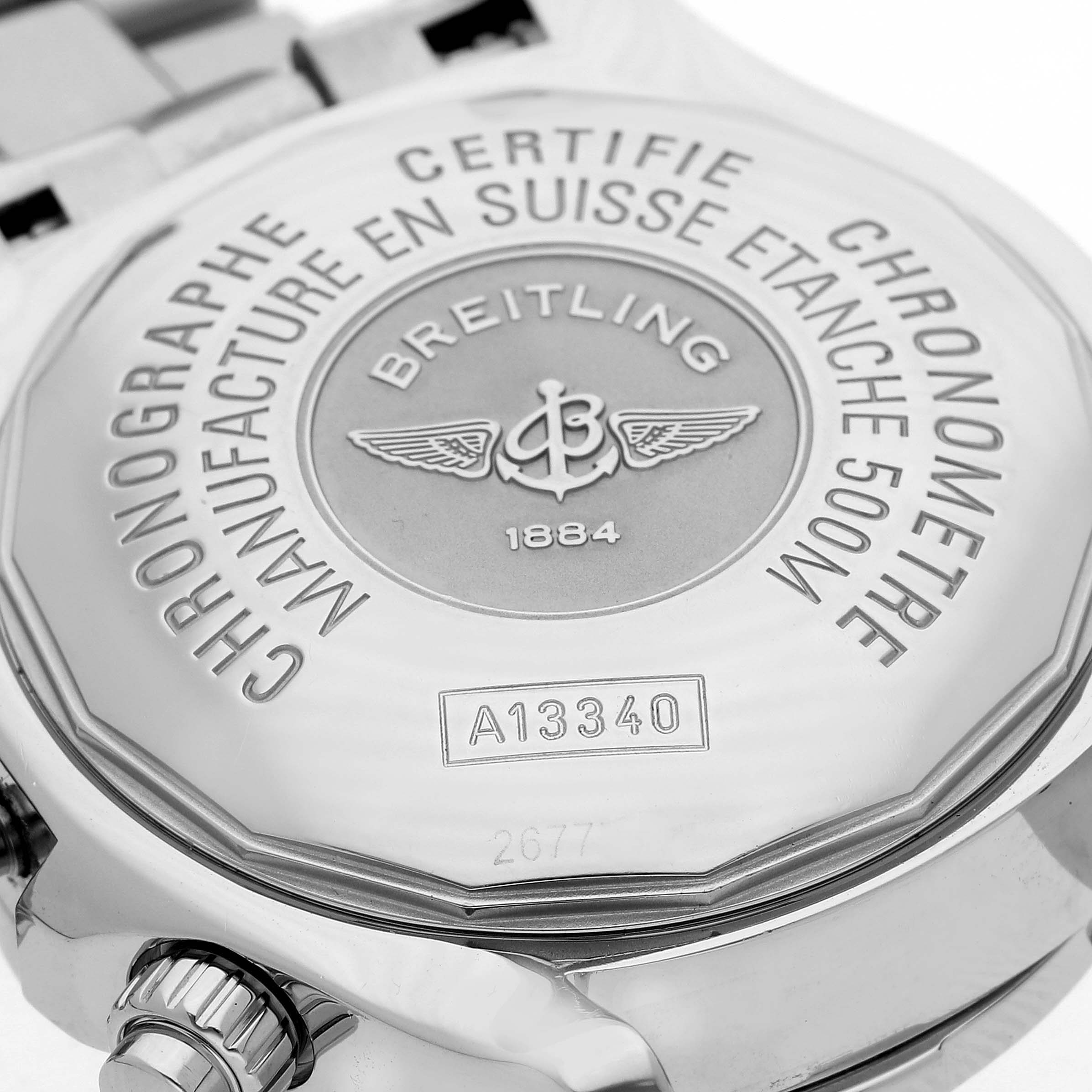 The image shows the case back of a Breitling Superocean watch, model number A13340, featuring engravings and part of the crown.