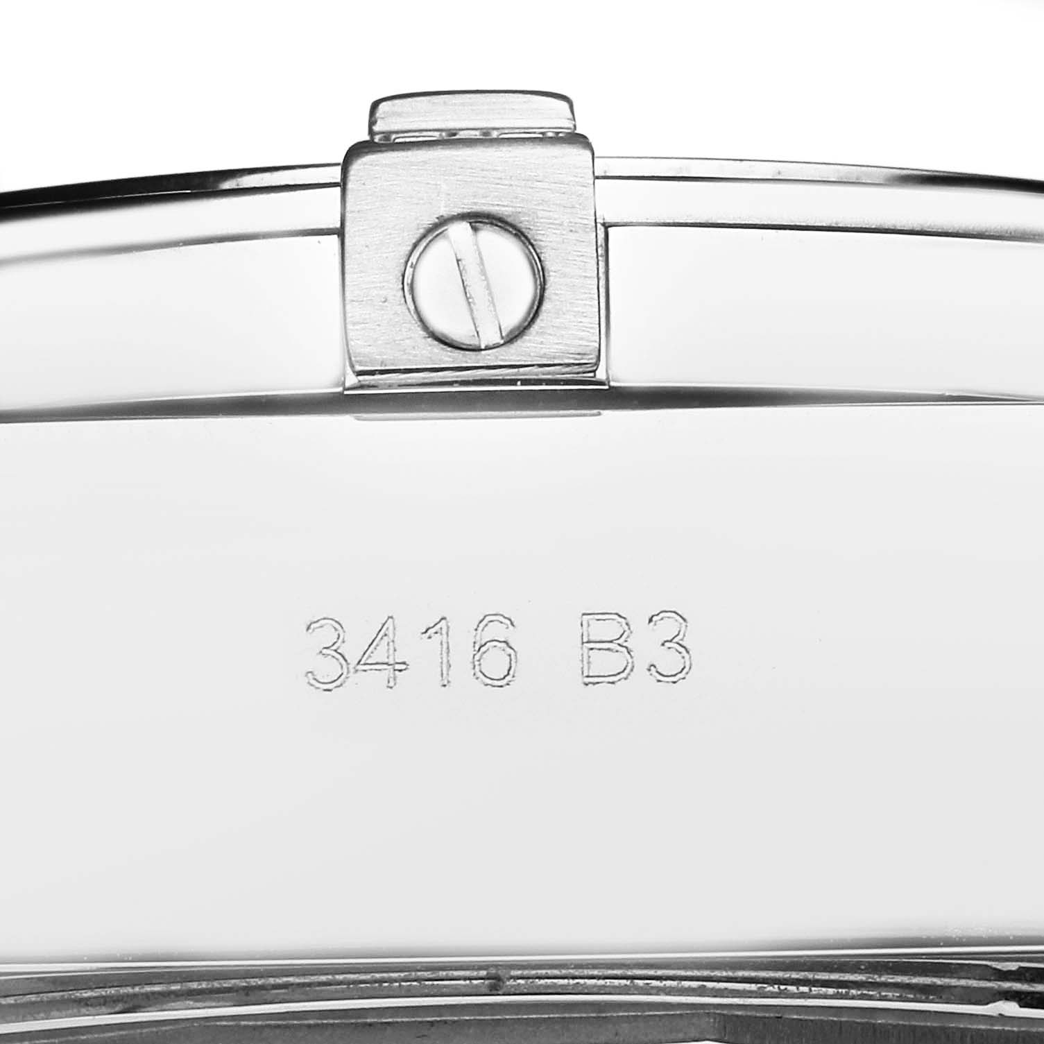 The image shows the clasp and part of the bracelet of a Breitling Windrider model A44355, with engraving visible on the metal surface.