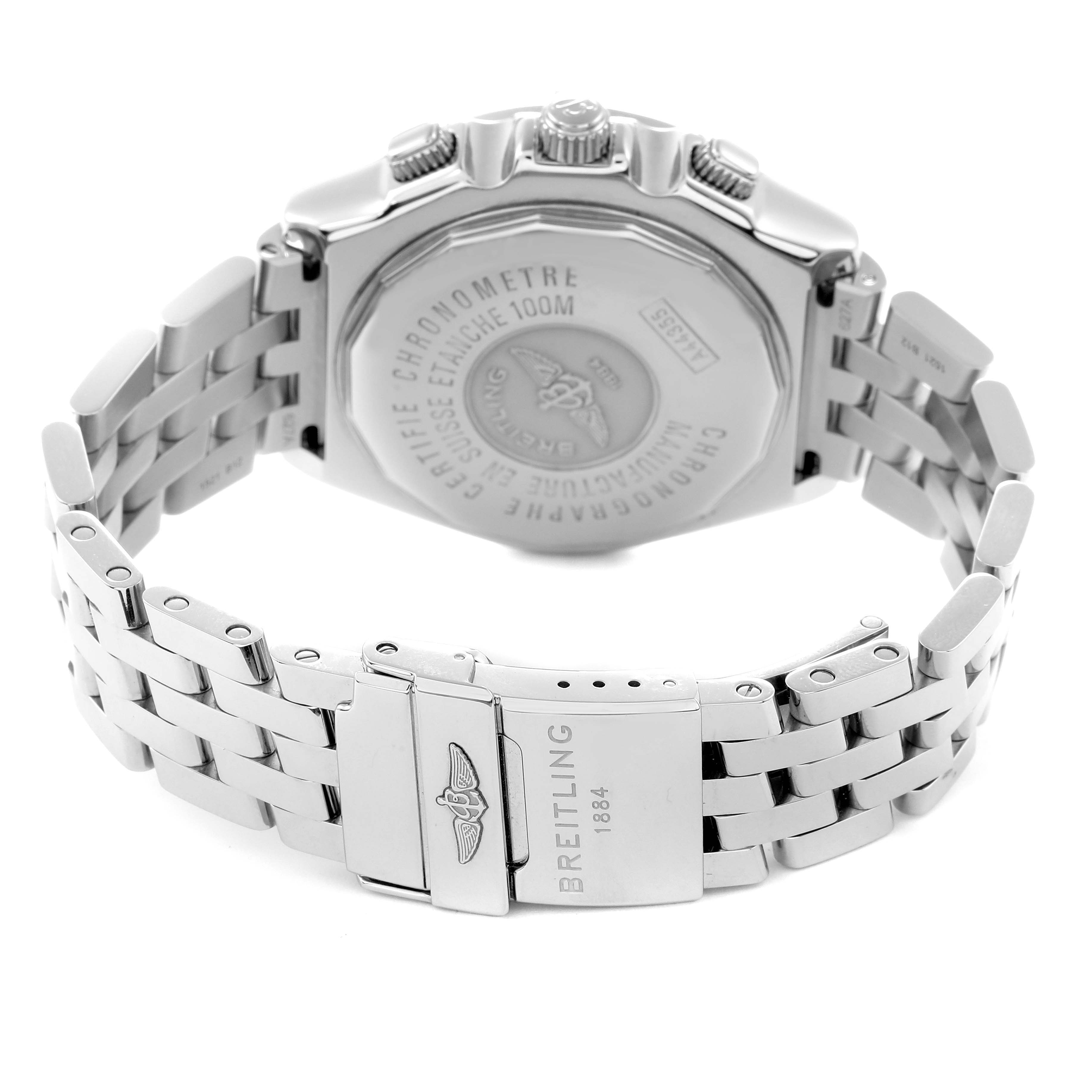 The image shows the Breitling Windrider model A44355 from the back, featuring the watch case back, deployment clasp, and part of the metal bracelet.