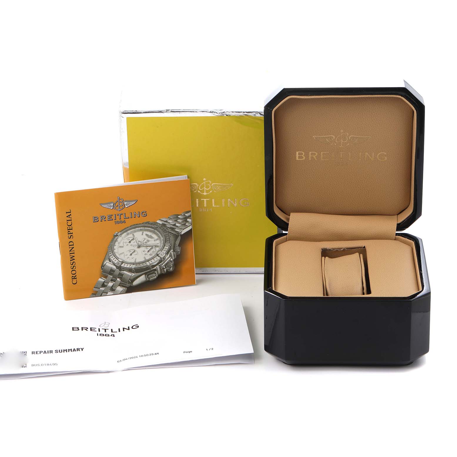 The image shows the Breitling Windrider A44355 watch box at an angle, with accompanying yellow booklet, manual, and documents visible.