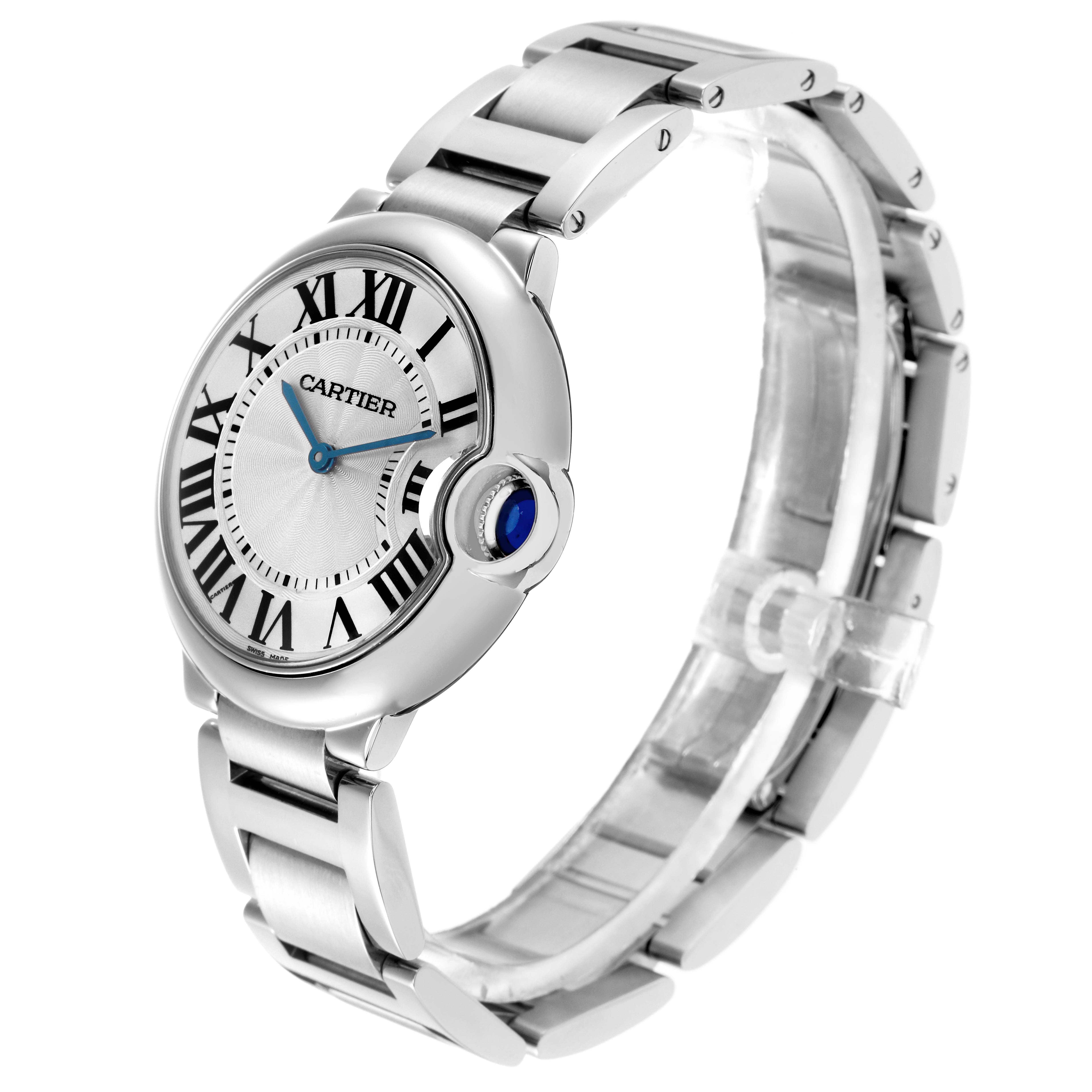 The image shows a Cartier Ballon Bleu model W69011Z4 men's watch at a slight angle, focusing on the face with Roman numerals and the silver bracelet.
