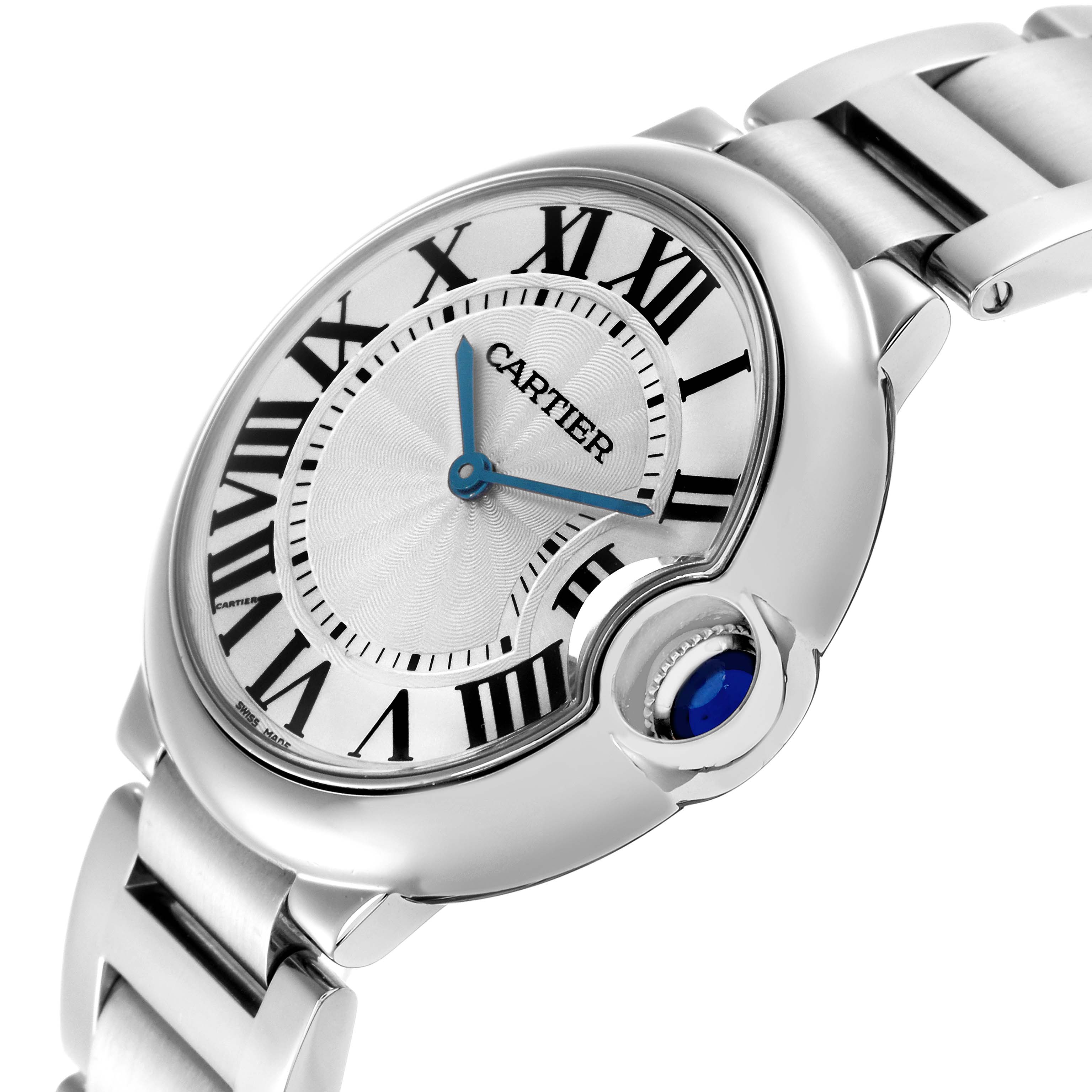 The Cartier Ballon Bleu model W69011Z4 watch is shown at a three-quarter angle, highlighting the face, Roman numerals, blue hands, and crown with a blue cabochon.