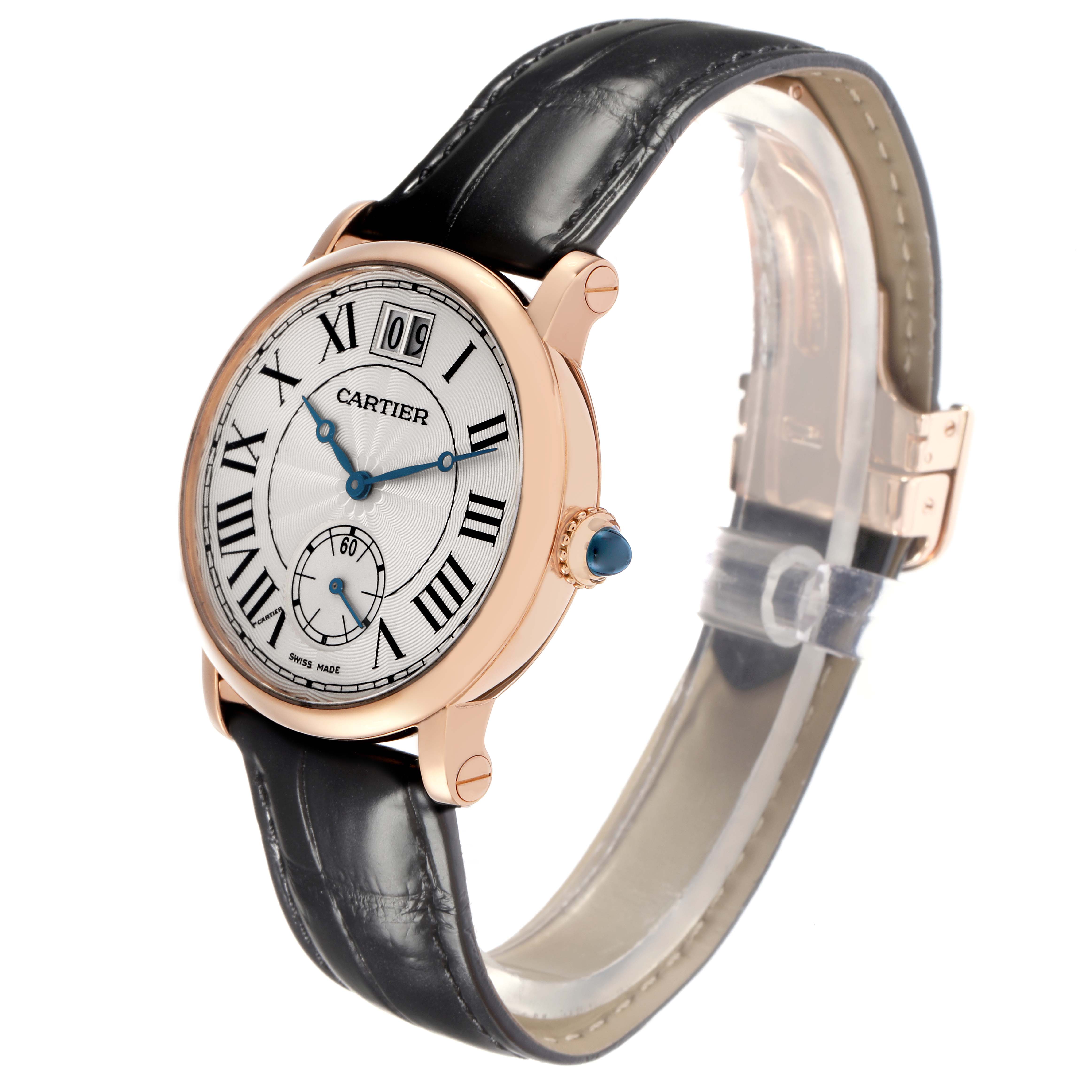 The Cartier Rotonde model W1552751 watch is shown at a three-quarter angle, highlighting its face, black leather strap, rose gold case, and blue-tipped crown.