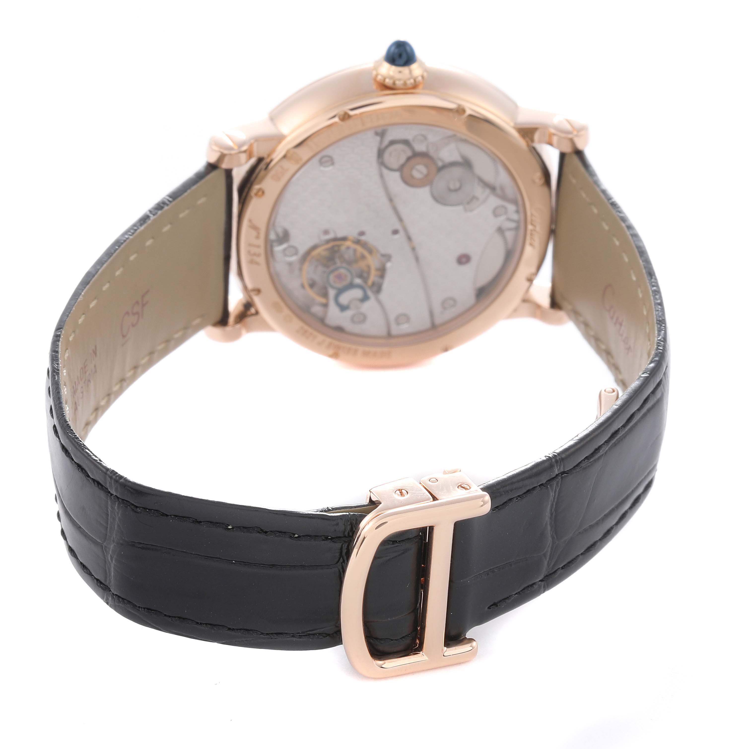 The image shows the back of a Cartier Rotonde model W1552751 men's watch at a slight angle, featuring the exhibition case back and leather strap with a deployant clasp.