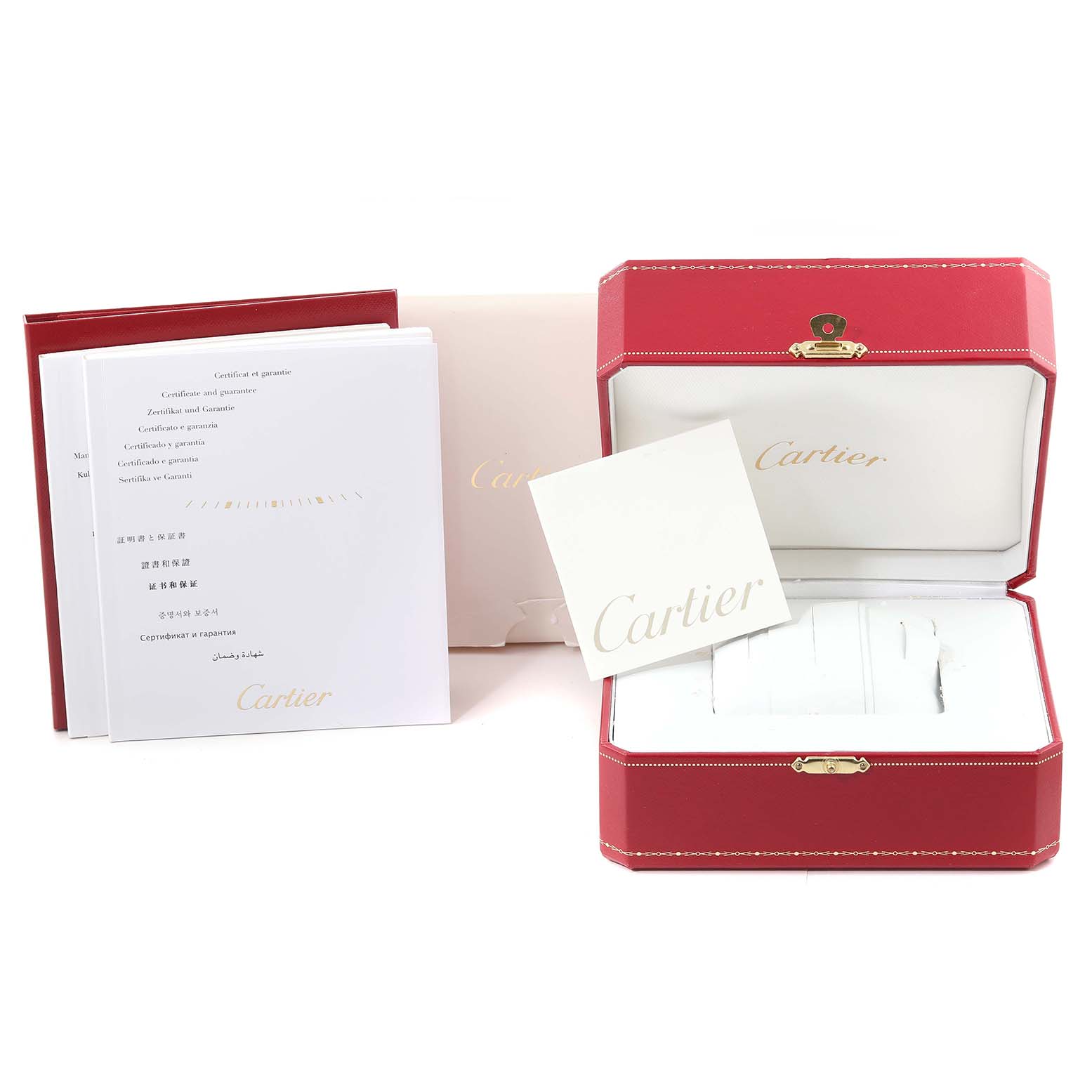 The image shows the packaging and documentation for the Cartier Santos Demoiselle W25066Z6 Women
s Stainless Steel Silver Dial W25066Z6 Women
s Stainless Steel Silver Dial watch, including a red box, booklets, and warranty cards.