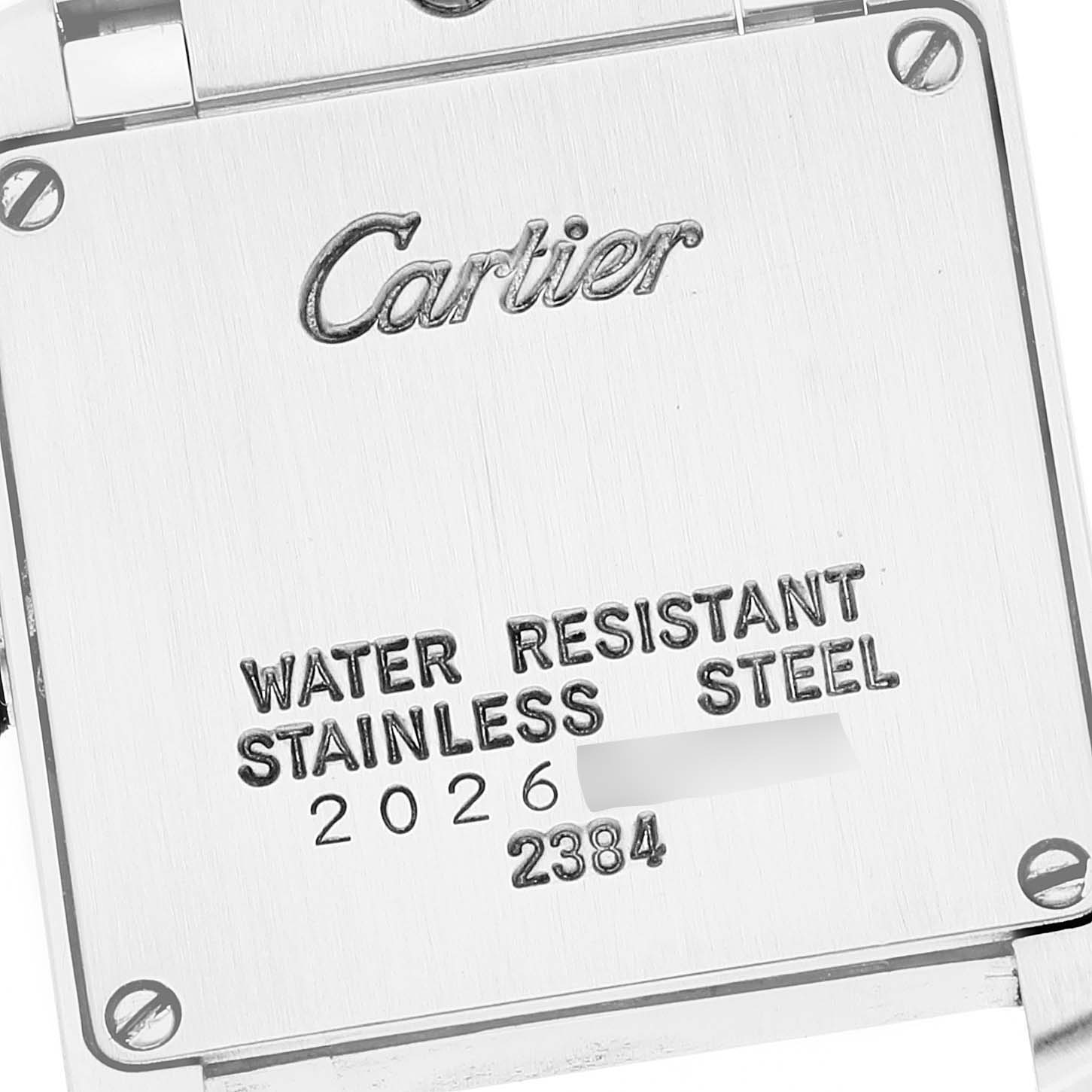 This is a close-up of the back case of a Cartier Tank Francaise W51008Q3 Women
s Stainless Steel Silver Dial W51008Q3 Women
s Stainless Steel Silver Dial watch showing the brand name and water resistance information.