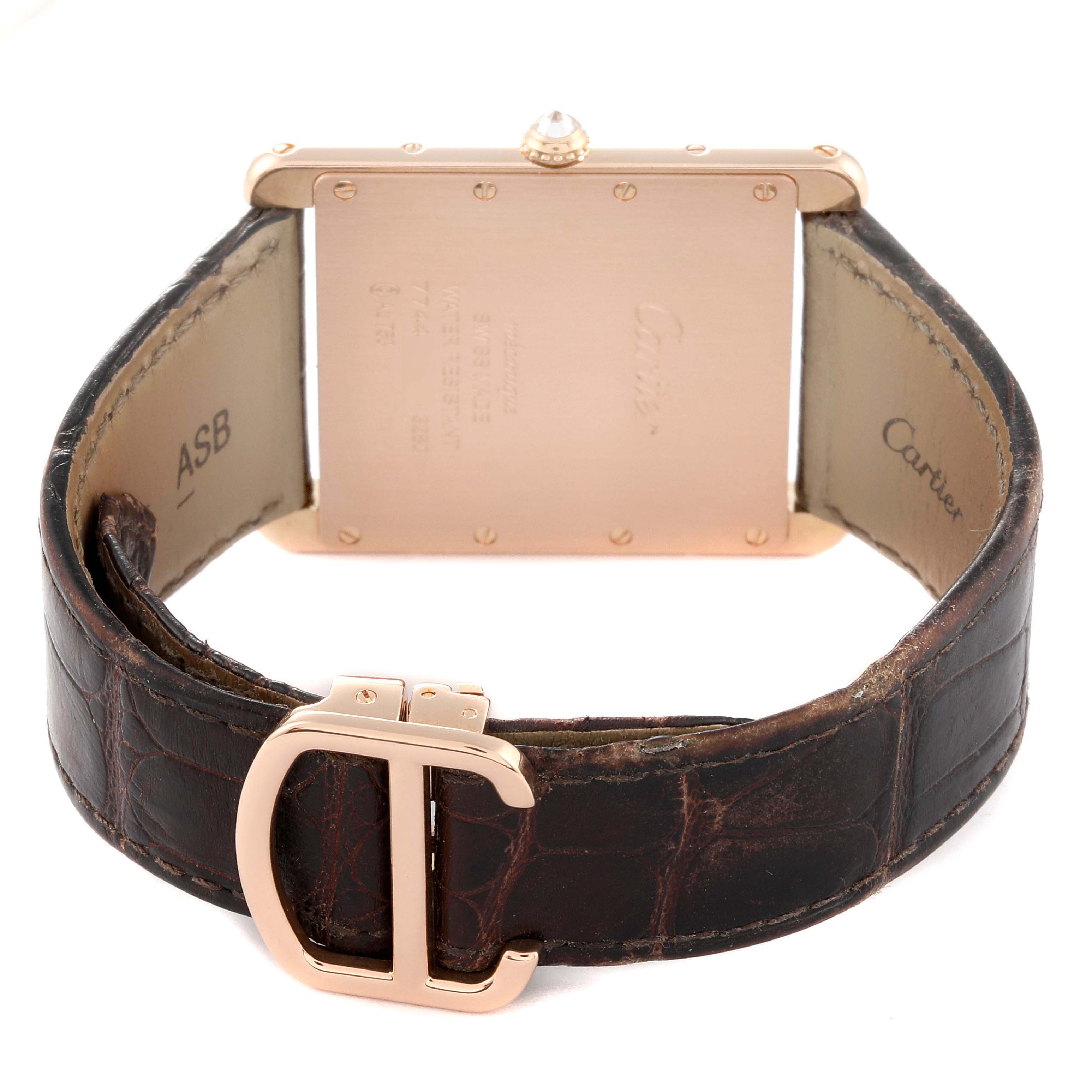 The image shows the back view of the Cartier Tank Louis WT200005 Men's Rose Gold Silver Dial WT200005 Men's Rose Gold Silver Dial watch, highlighting its buckle and strap.