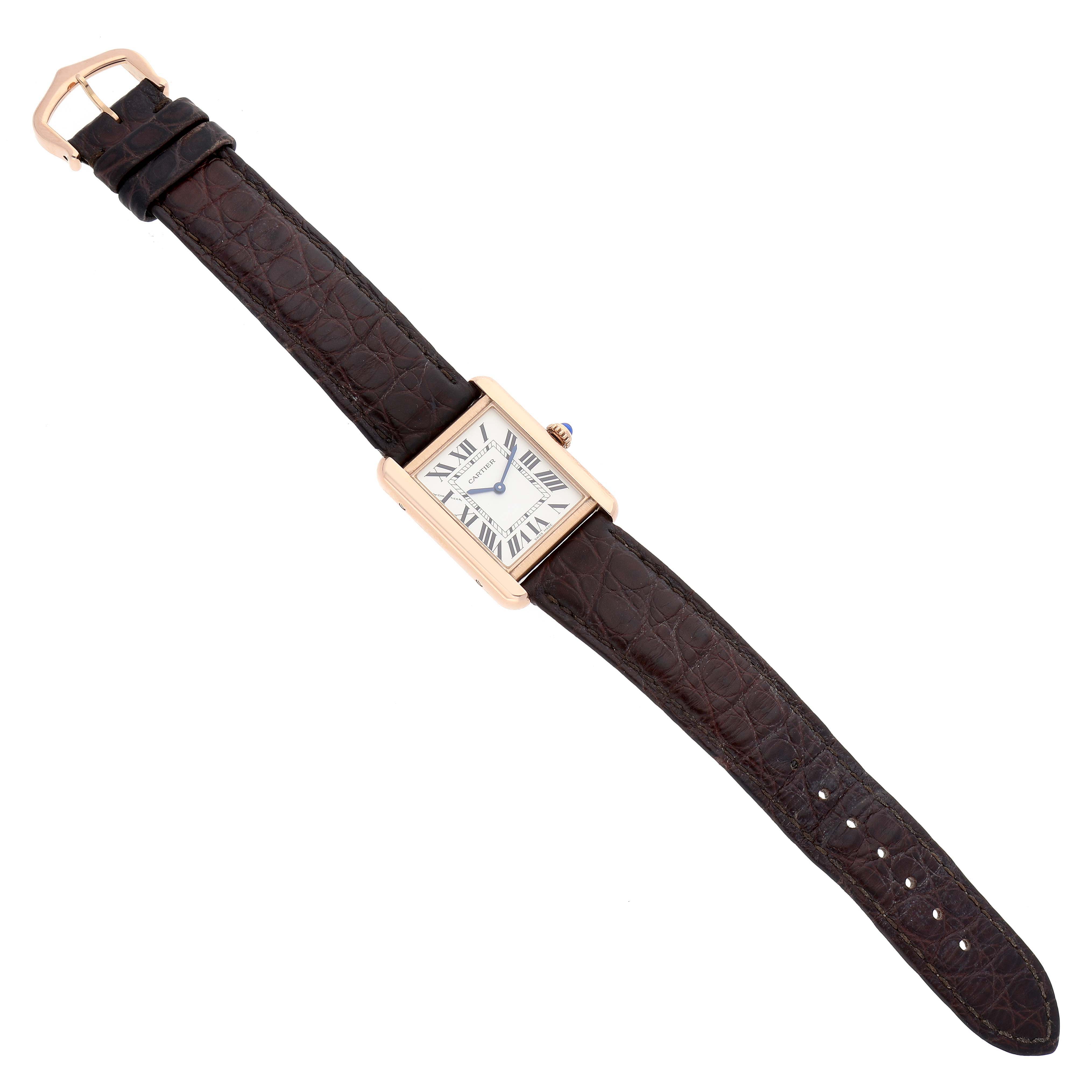 The image shows a Cartier Tank Solo W5200024 Women
s Steel and Gold (two tone) Silver Dial W5200024 Women
s Steel and Gold (two tone) Silver Dial watch with a leather strap, viewed from above, displaying the full face and strap.