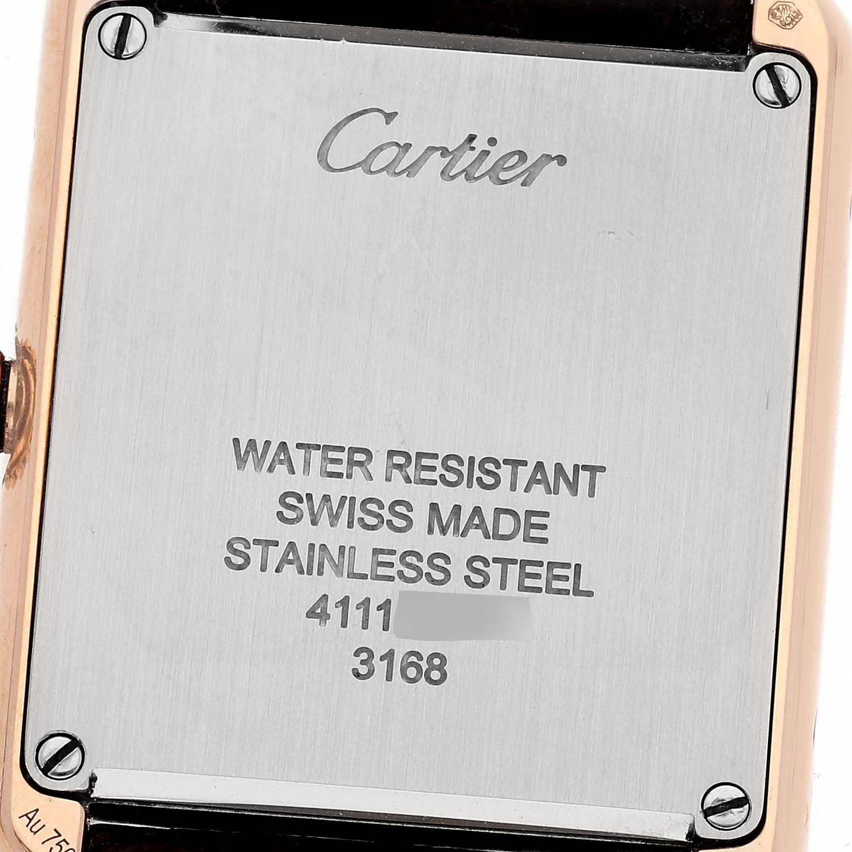 The image shows the back case of a Cartier Tank Solo W5200024 Women
s Steel and Gold (two tone) Silver Dial W5200024 Women
s Steel and Gold (two tone) Silver Dial watch, displaying the brand, model details, and material specifications.