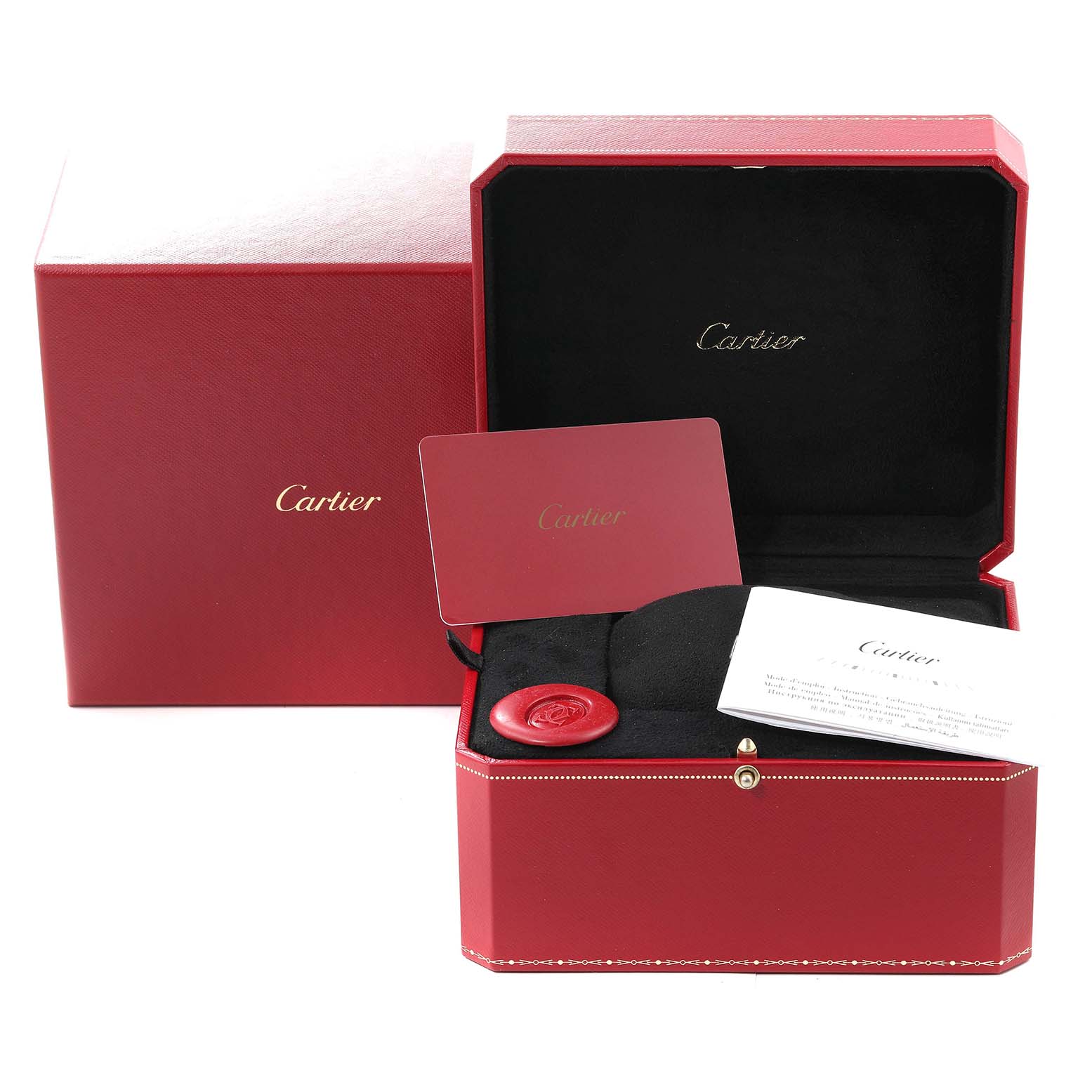 The image shows the red box, inner display case, card, and documentation for a Cartier Tank Solo W5200024 Women
s Steel and Gold (two tone) Silver Dial W5200024 Women
s Steel and Gold (two tone) Silver Dial model watch.