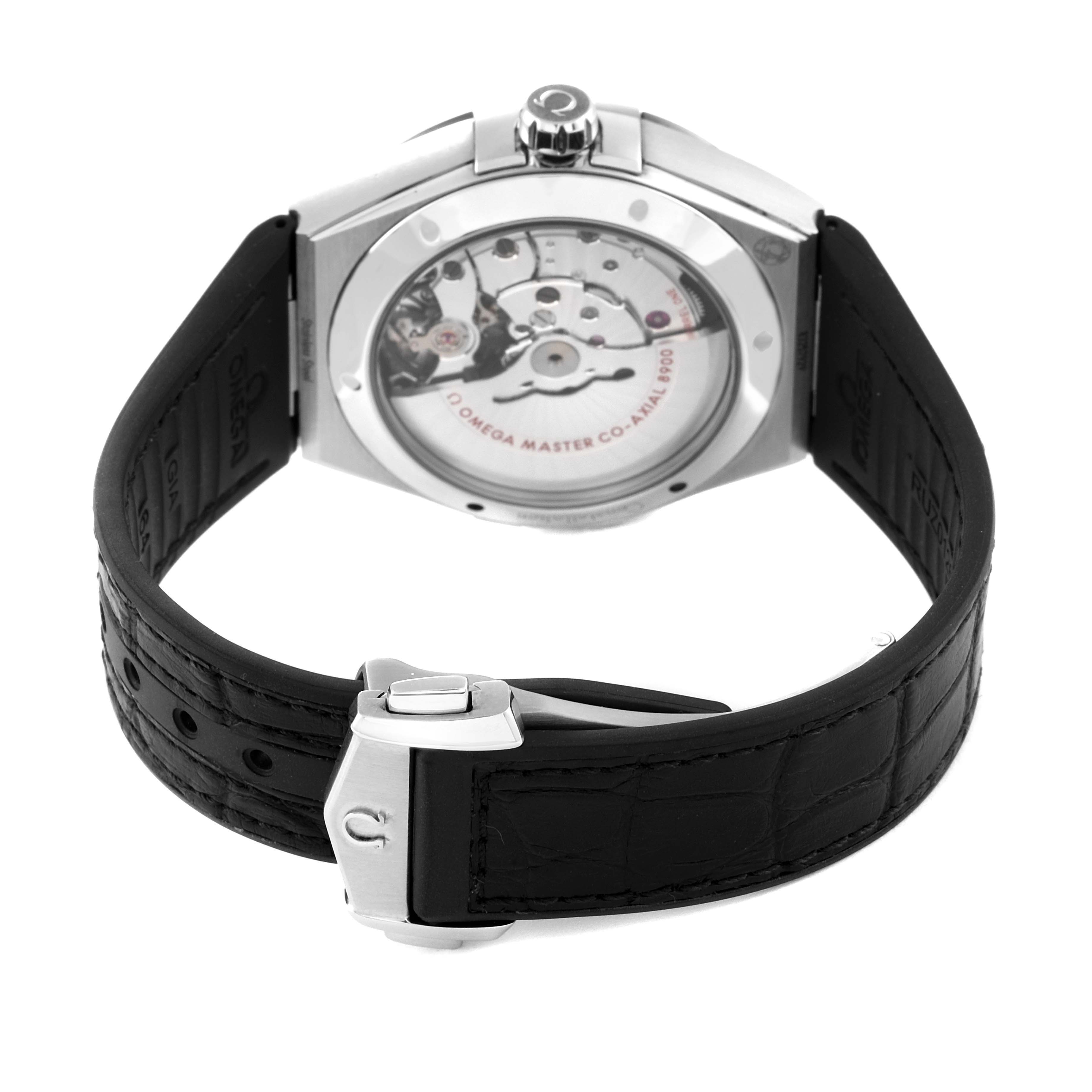 The image shows the back view of an Omega Constellation 131.33.41.21.06.001 Men's Stainless Steel Grey Dial 131.33.41.21.06.001 Men's Stainless Steel Grey Dial watch, highlighting the movement mechanism and leather strap.