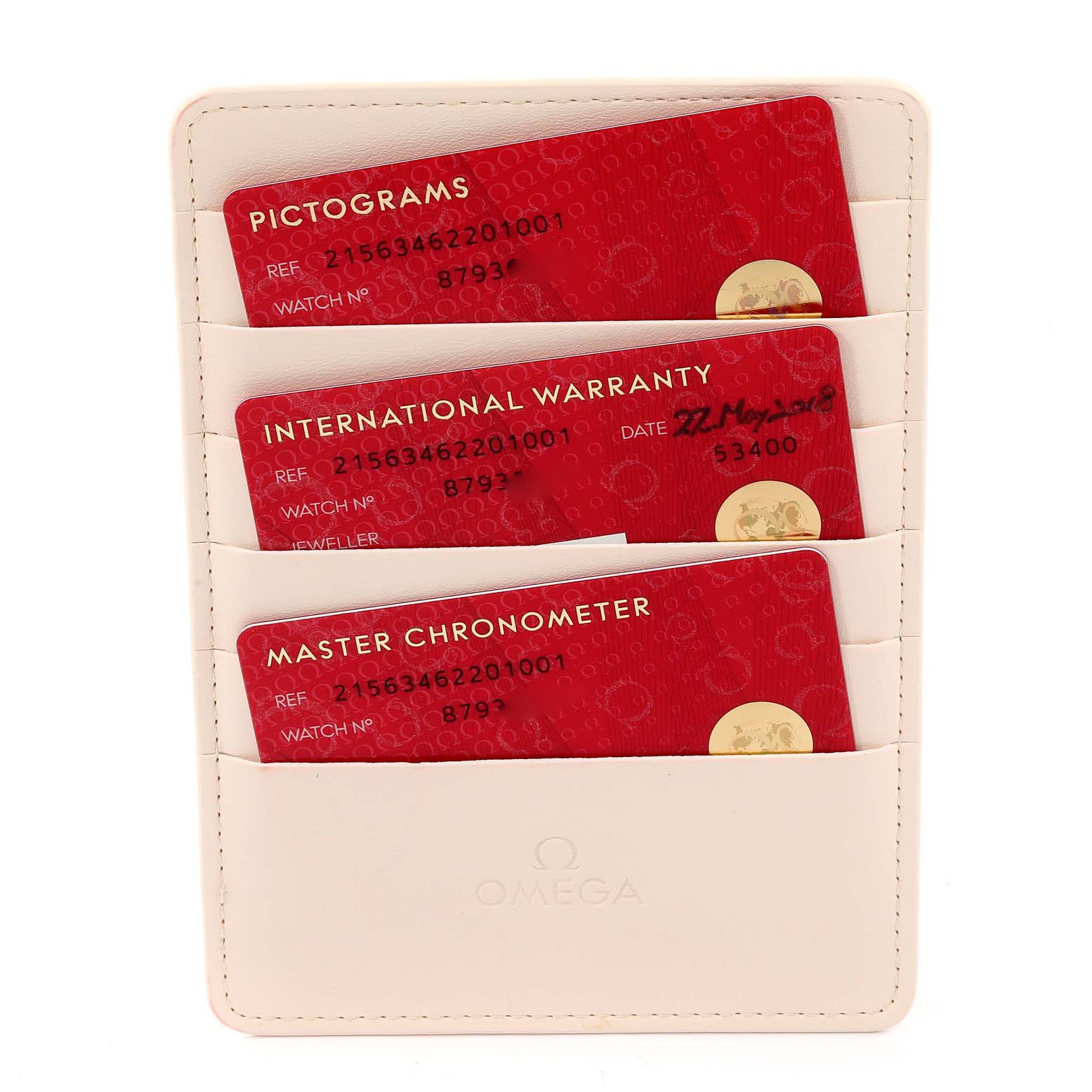 The image shows warranty cards and pictograms for the Omega Planet Ocean 215.63.46.22.01.001 Men's Ceramic Black Dial 215.63.46.22.01.001 Men's Ceramic Black Dial model, displayed in a white cardholder.