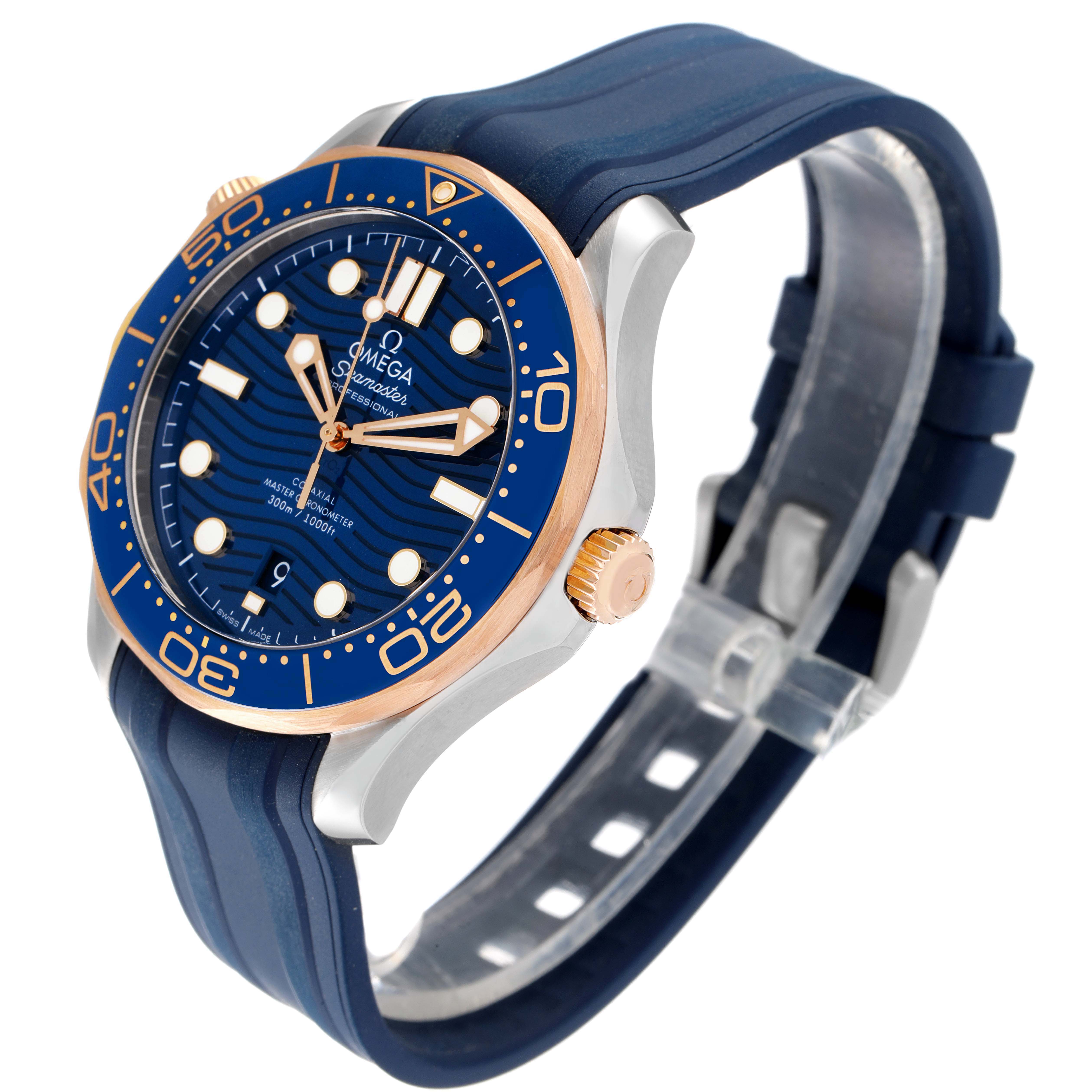 This Omega Seamaster 210.22.42.20.03.002 Men's Steel and Gold (two tone) Blue Dial 210.22.42.20.03.002 Men's Steel and Gold (two tone) Blue Dial watch is shown from a front and side angle, highlighting its face, bezel, crown, and blue strap.