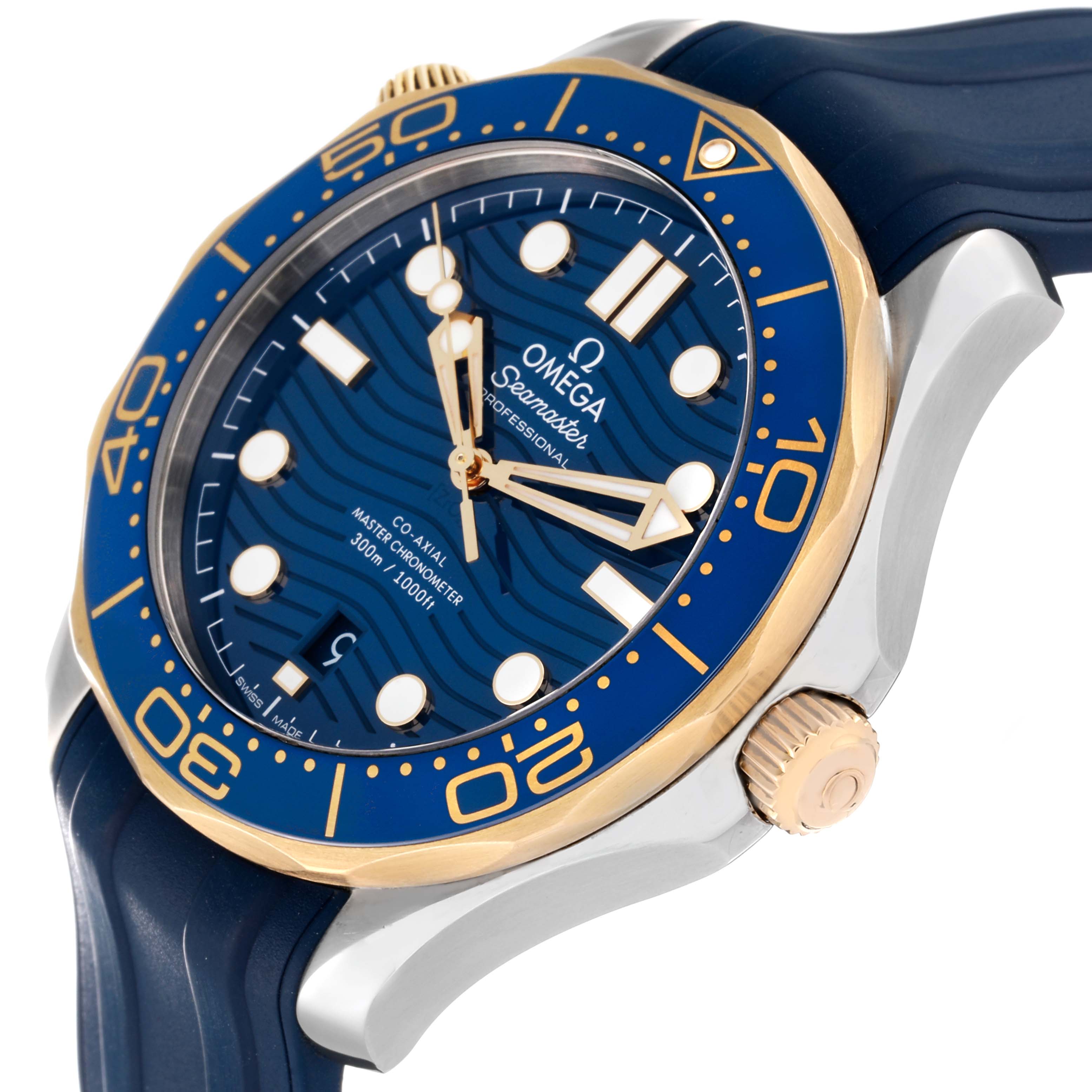 The image shows an angled close-up of the Omega Seamaster 210.22.42.20.03.001 Men's Steel and Gold (two tone) Blue Dial 210.22.42.20.03.001 Men's Steel and Gold (two tone) Blue Dial watch, highlighting its bezel, dial, crown, and strap.