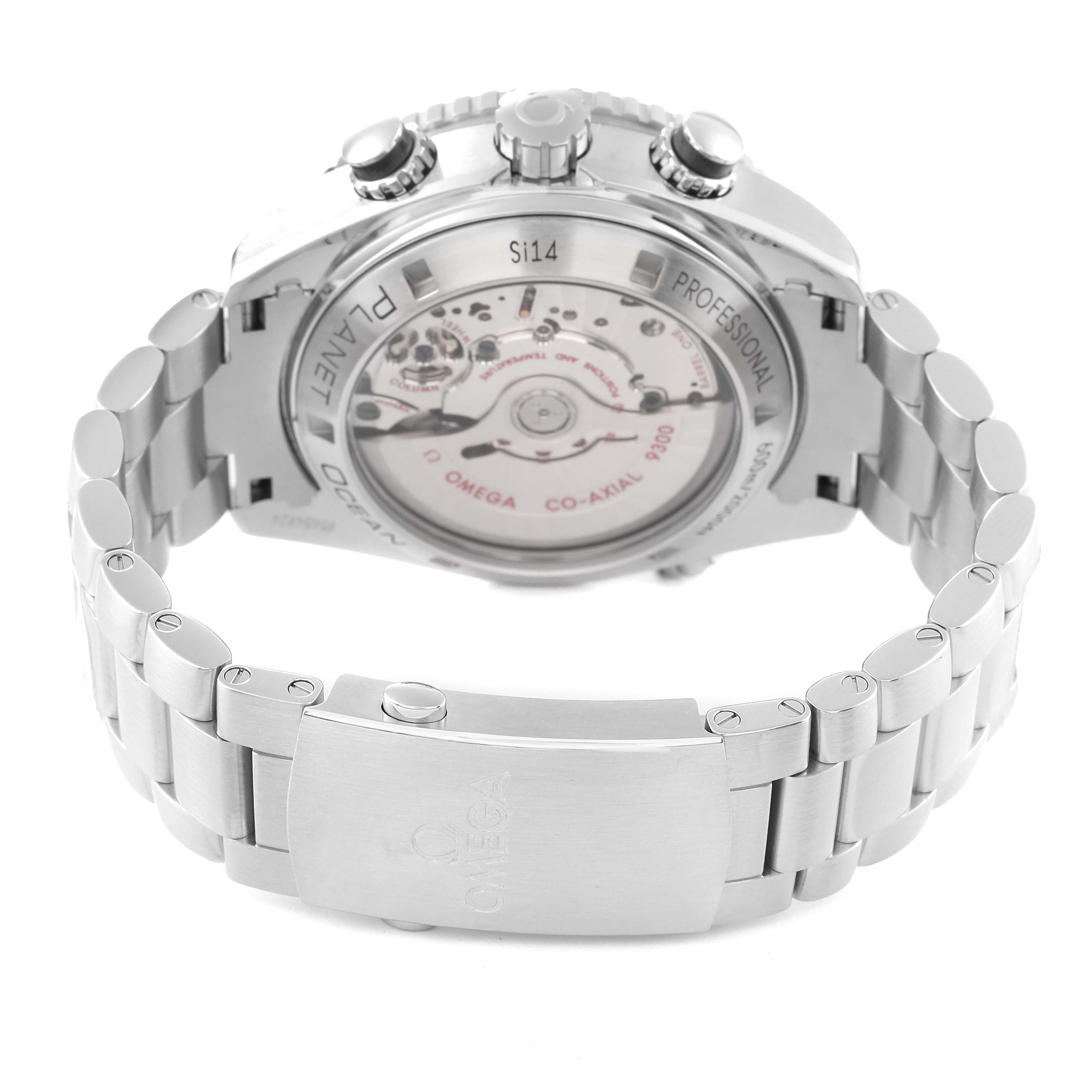 The image shows the back case and bracelet of an Omega Planet Ocean 232.30.46.51.01.001 Men
s Stainless Steel Black Dial 232.30.46.51.01.001 Men
s Stainless Steel Black Dial watch, highlighting the movement and clasp.