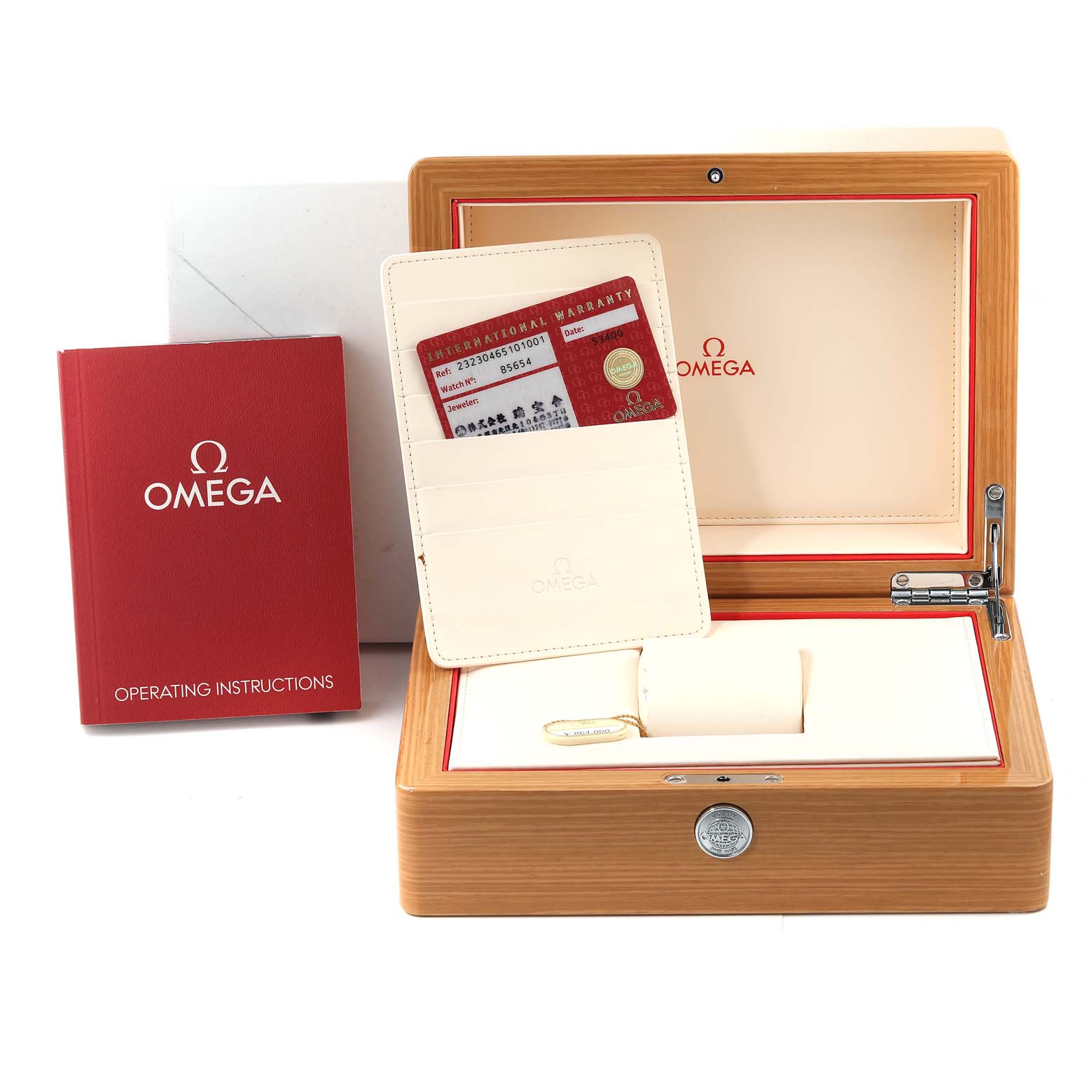 This image shows the packaging for an Omega Planet Ocean 232.30.46.51.01.001 Men
s Stainless Steel Black Dial 232.30.46.51.01.001 Men
s Stainless Steel Black Dial watch, including a wooden box, warranty card, and operating instructions manual.