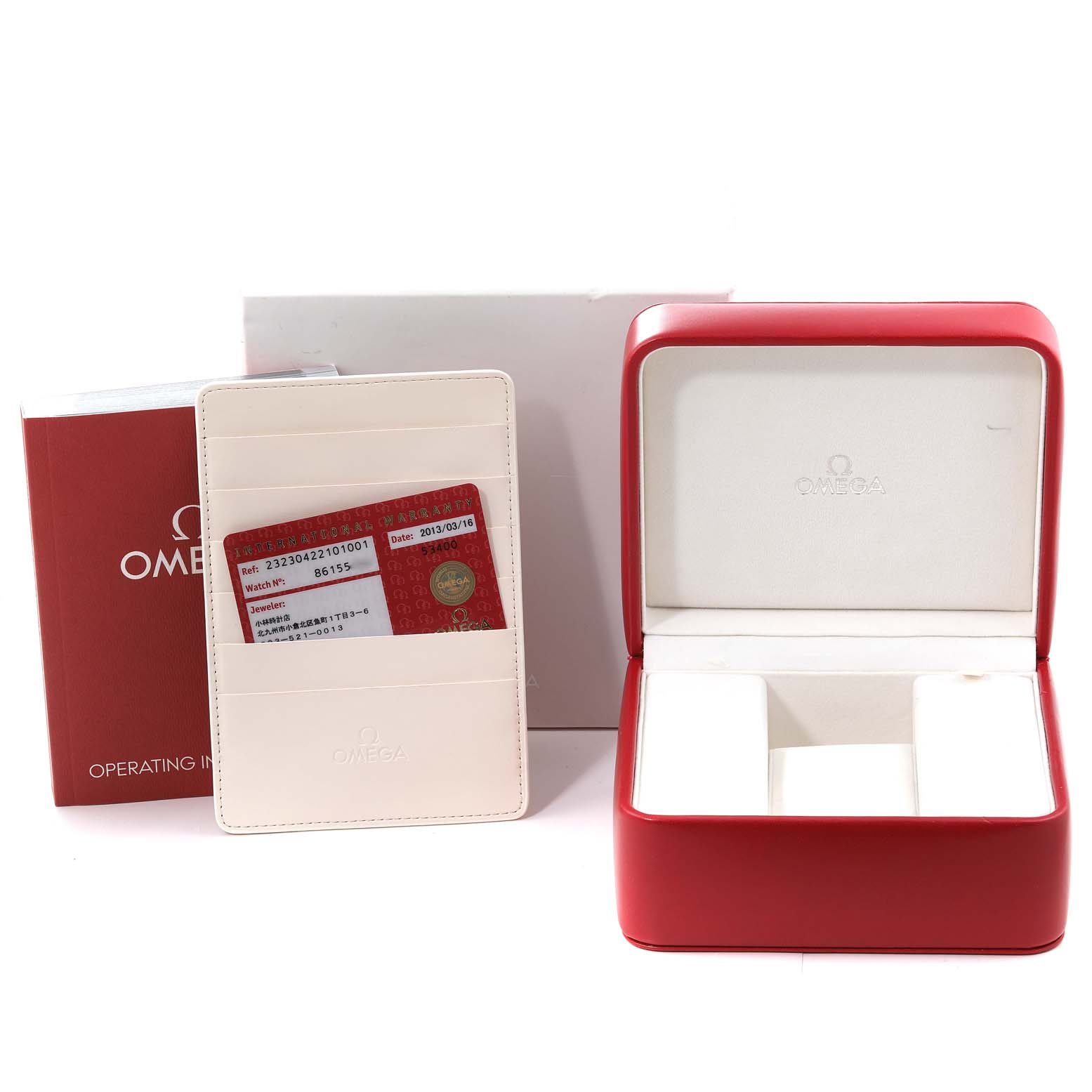 The image shows the Omega Planet Ocean 232.30.42.21.01.003 Men
s Stainless Steel Black Dial 232.30.42.21.01.003 Men
s Stainless Steel Black Dial
s red box, operating instructions, warranty card, and cardholder.