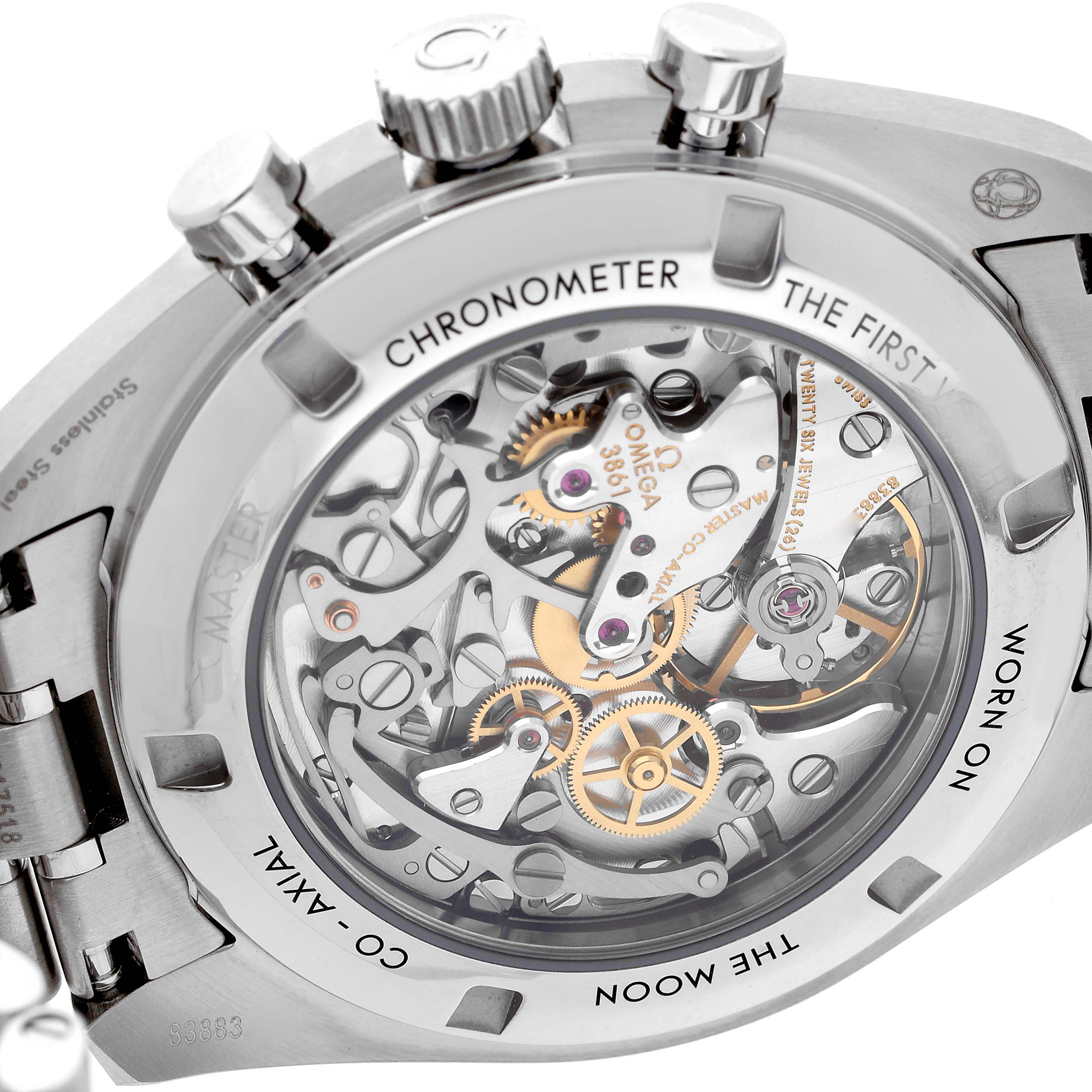 The image shows the back of the Omega Speedmaster model 310.30.42.50.04.001, highlighting the intricate movement and gears.