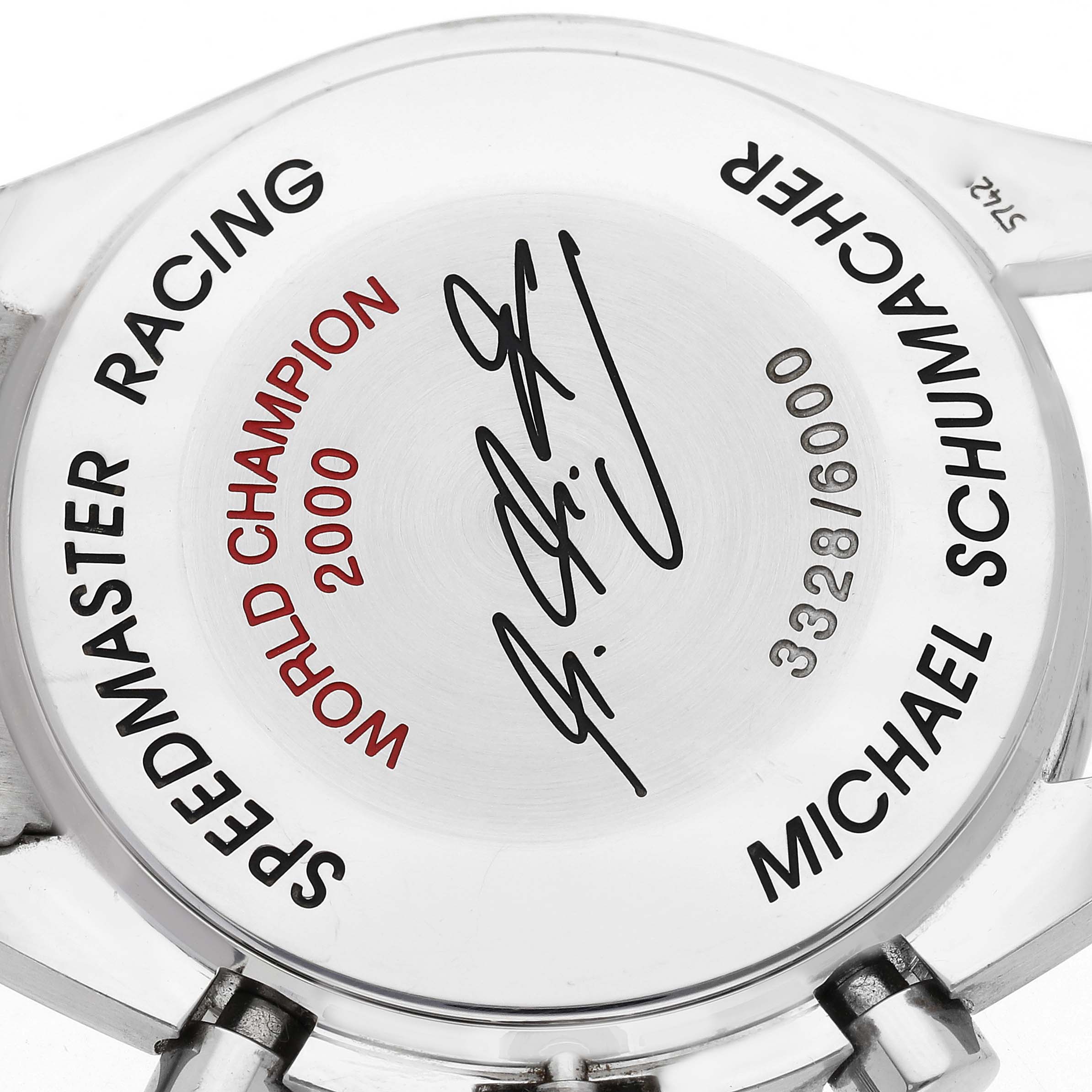 The image shows the case back of the Omega Speedmaster model 3518.50.00, featuring engravings and a signature, viewed from the back.