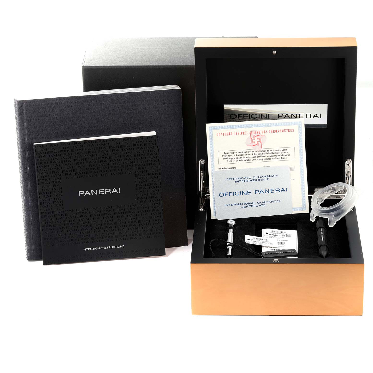 The image shows a Panerai Luminor PAM00299 Men
s Stainless Steel Black Dial PAM00299 Men
s Stainless Steel Black Dial watch box and accessories including booklets, certificates, and tools, viewed from the front.