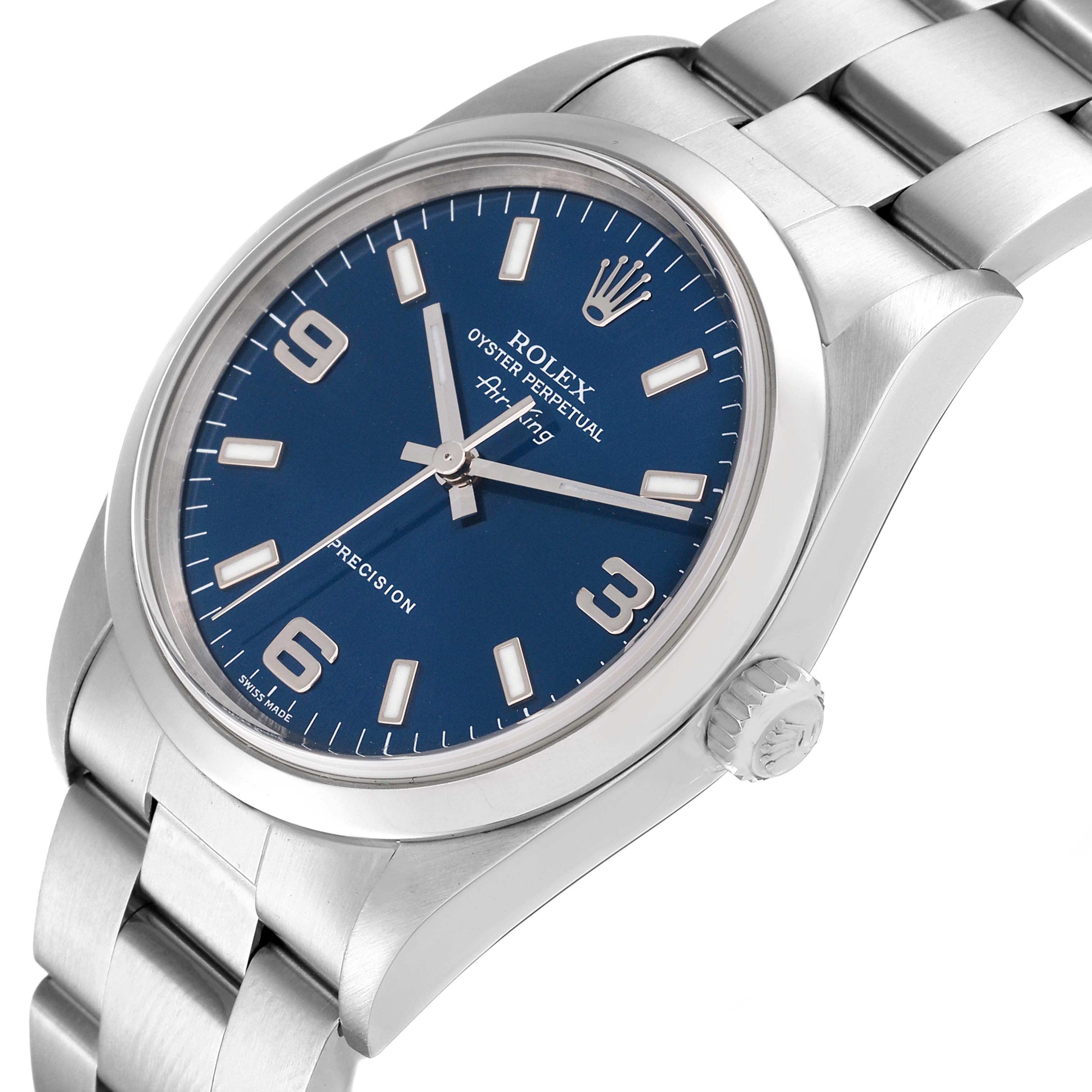 The image shows a side angle of the Rolex Air-King 14000 Men's Stainless Steel Blue Dial 14000 Men's Stainless Steel Blue Dial watch, highlighting its blue dial, crown, and stainless steel bracelet.